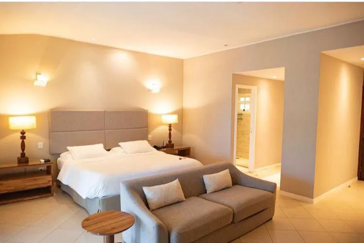 Bed in Pousada Zé Maria