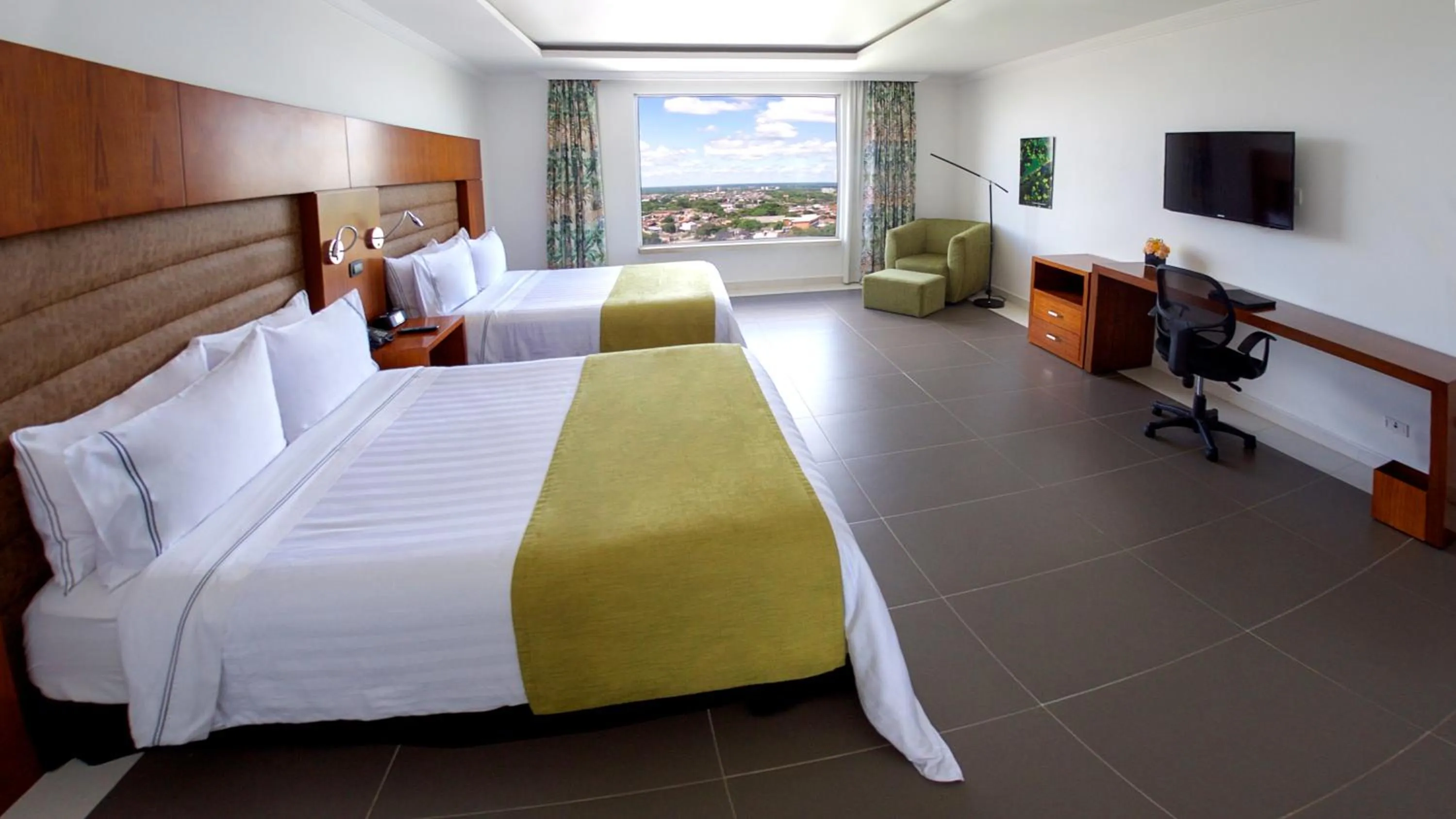 Bed in GHL Hotel Grand Villavicencio