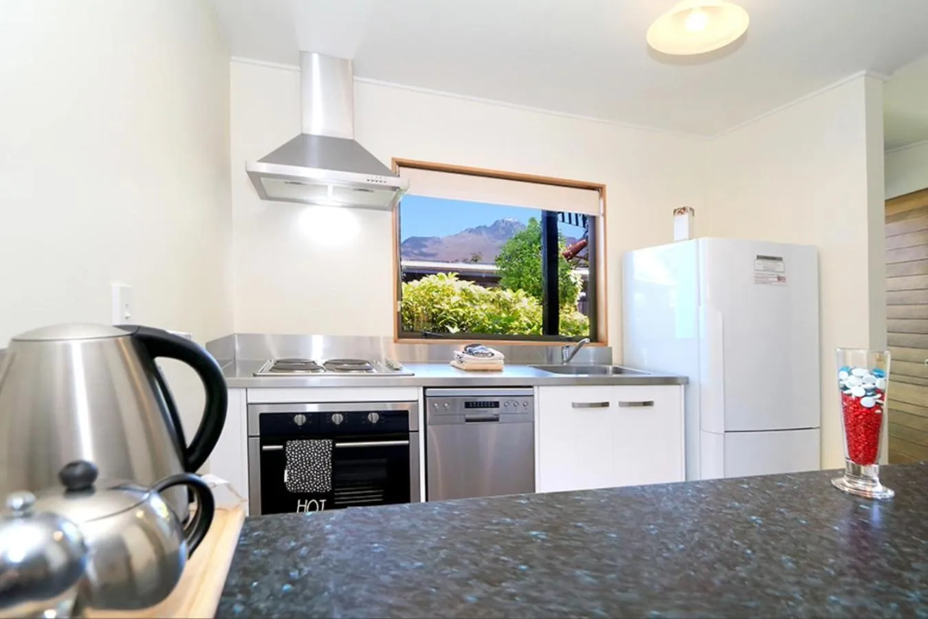 Kitchen or kitchenette in Queenstown Holiday Park Creeksyde