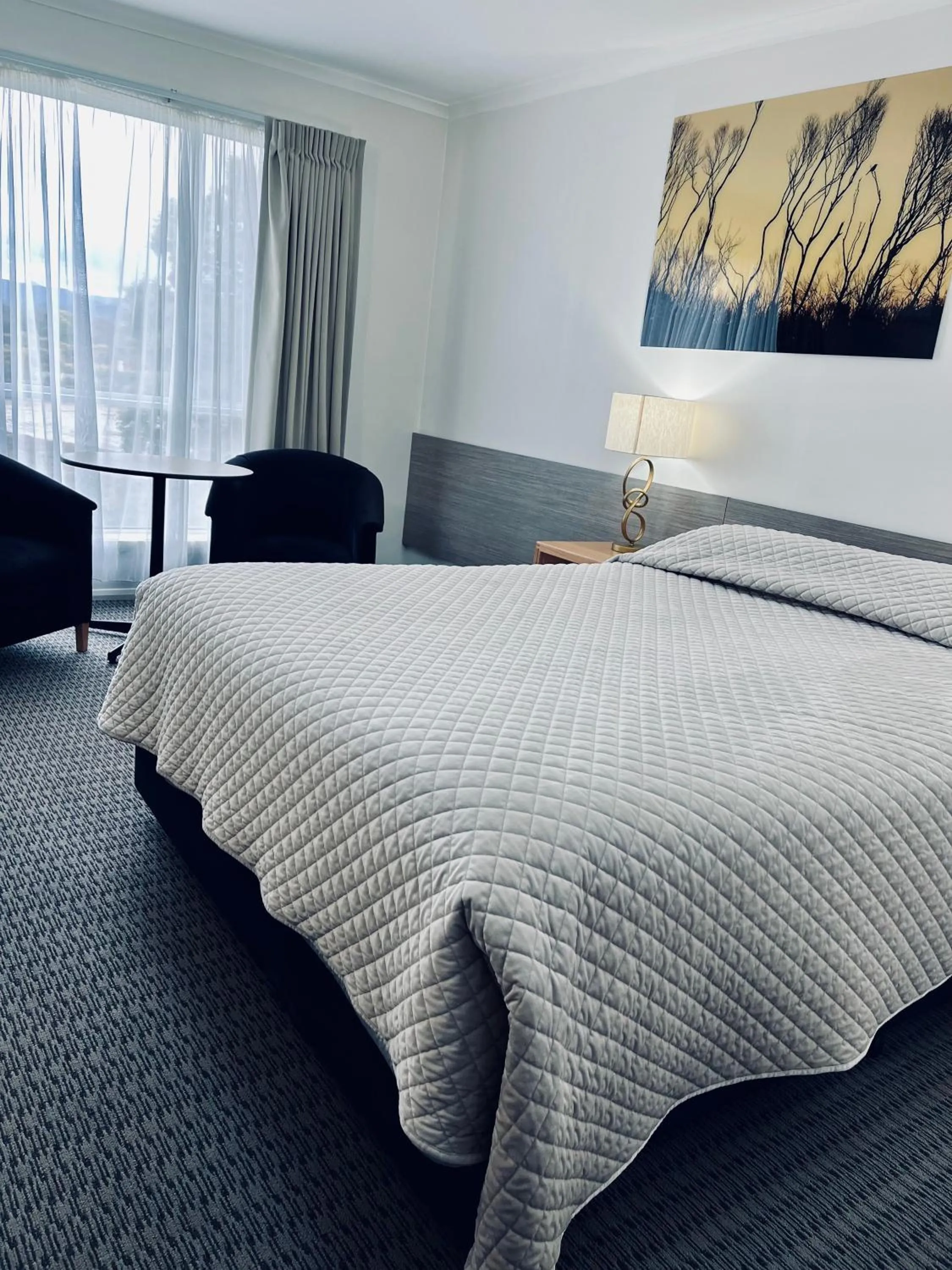 Bed in Heemskirk Motor Hotel