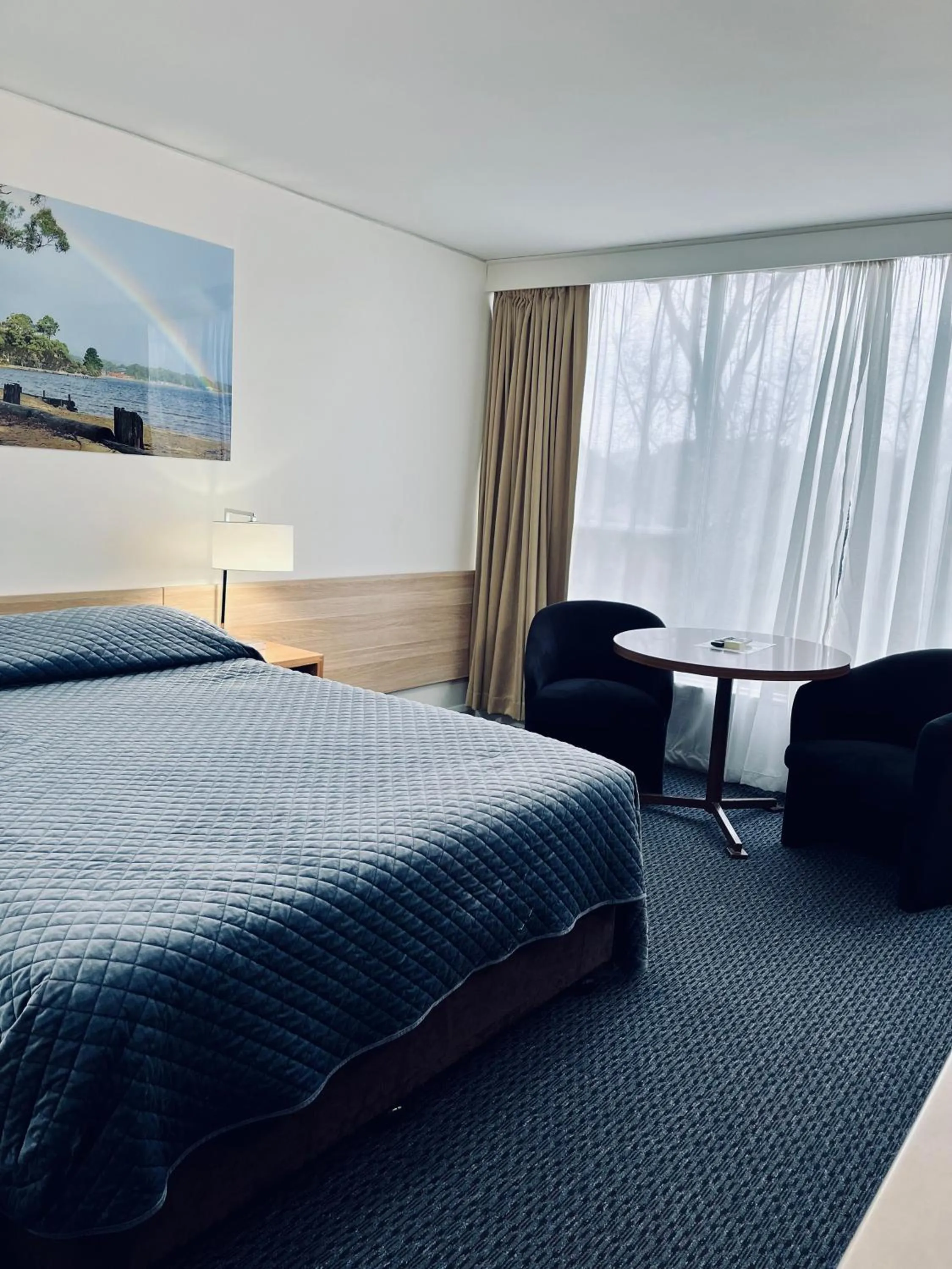 Bed in Heemskirk Motor Hotel