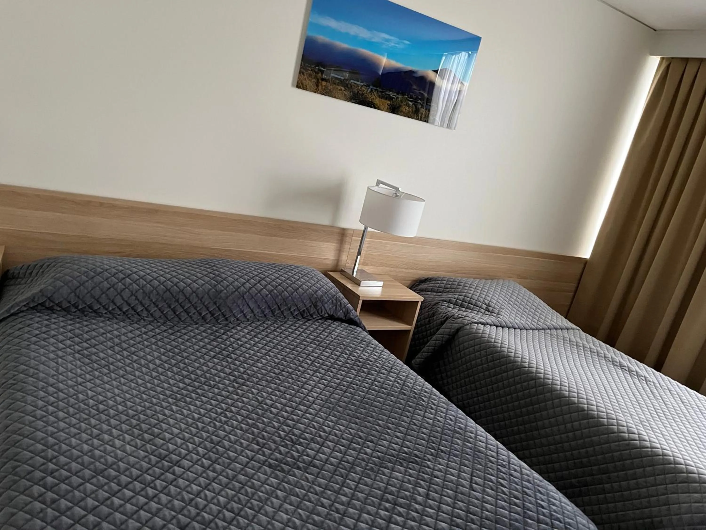 Bed in Heemskirk Motor Hotel