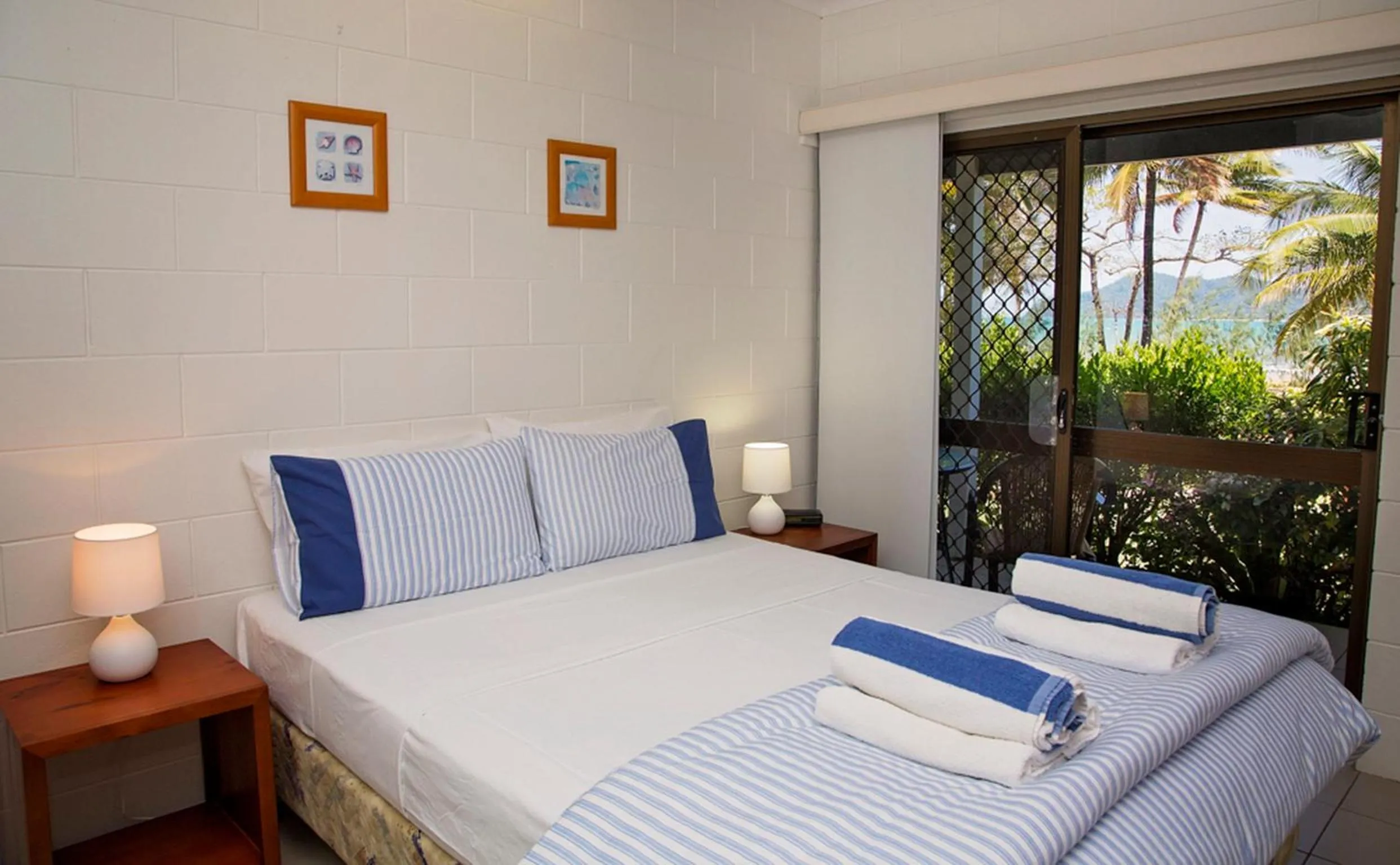 Bed in Apollo Jewel Beachfront Apartments