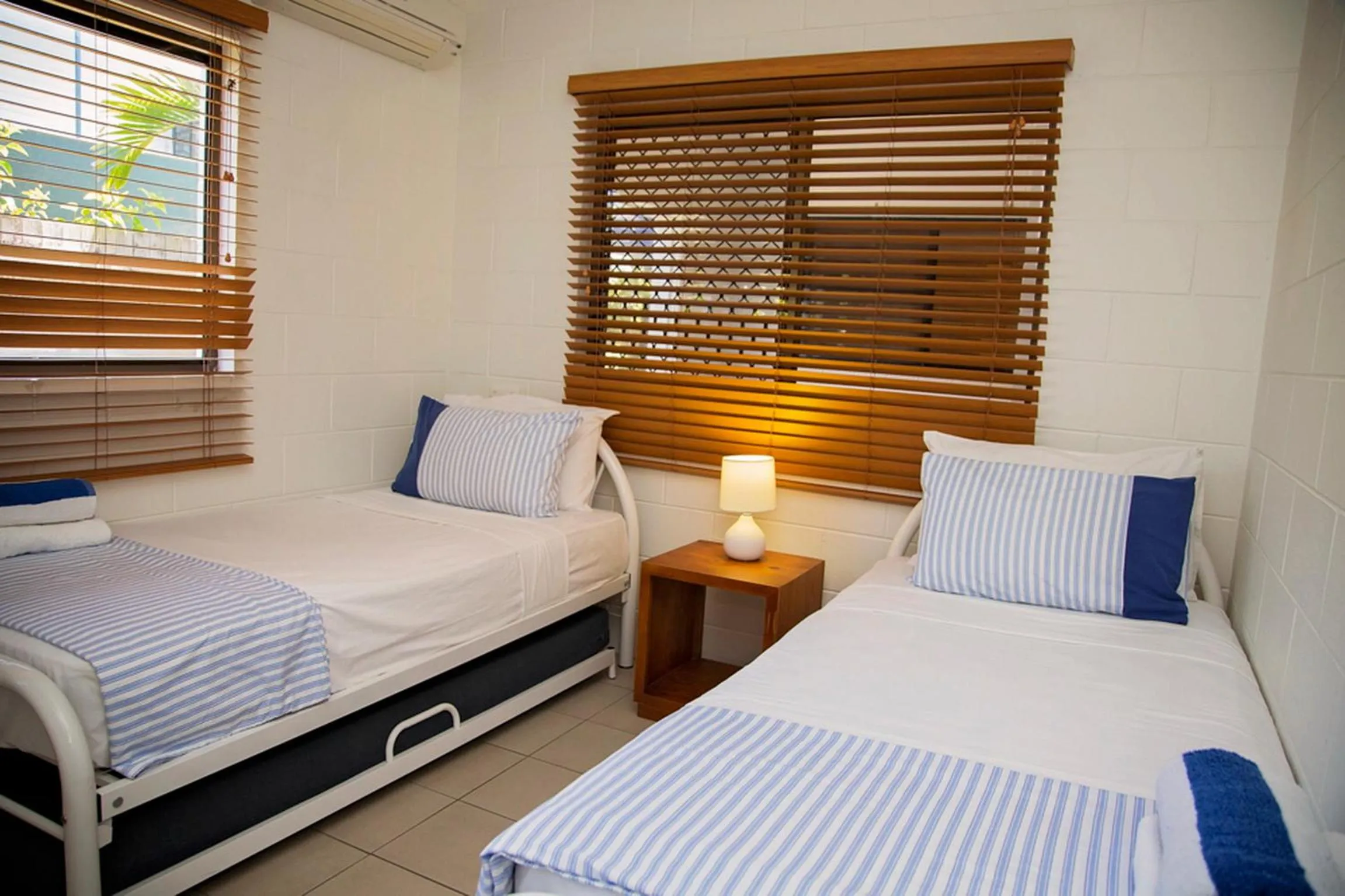 Bed in Apollo Jewel Beachfront Apartments