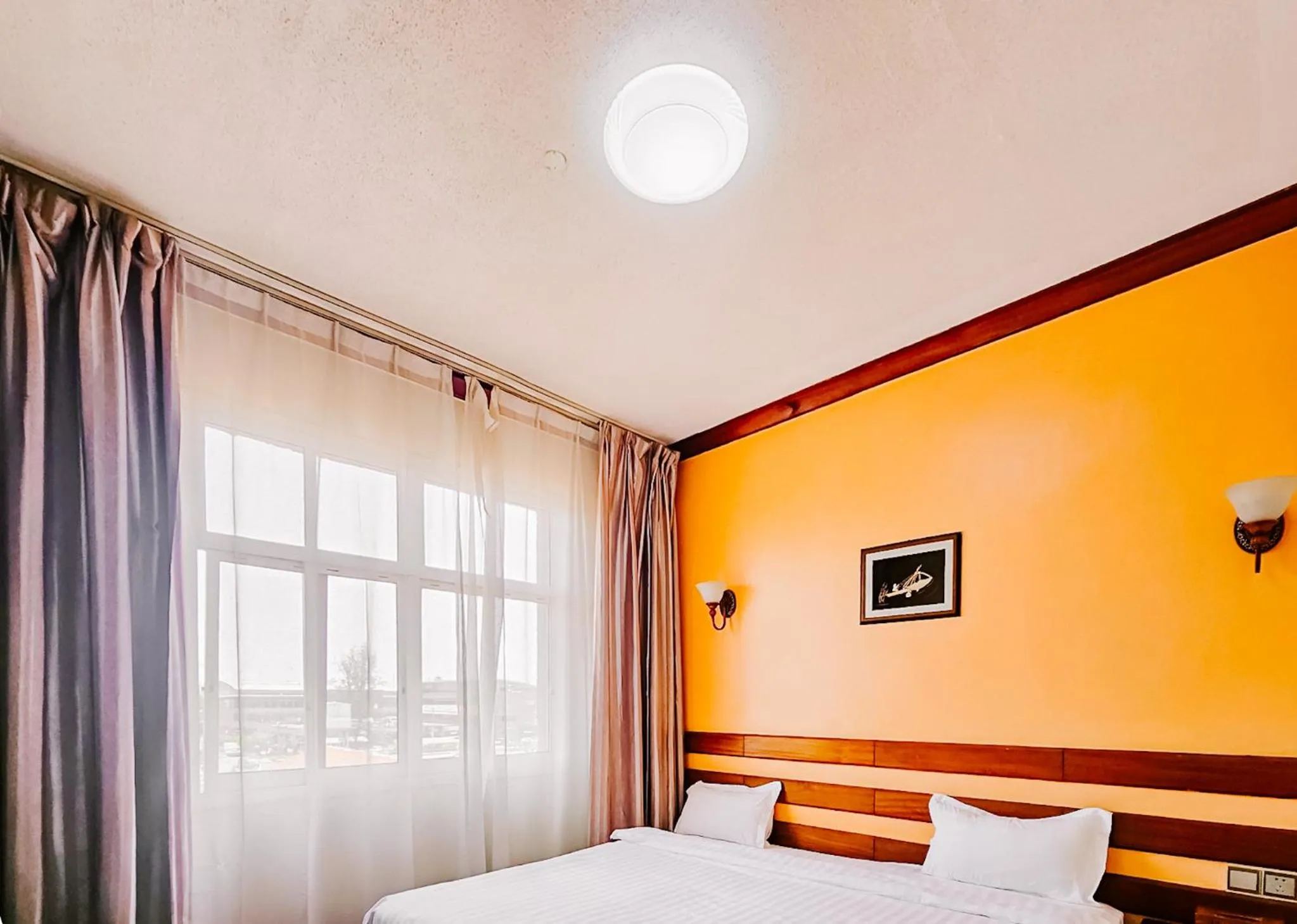 Bed in Eastland Hotel