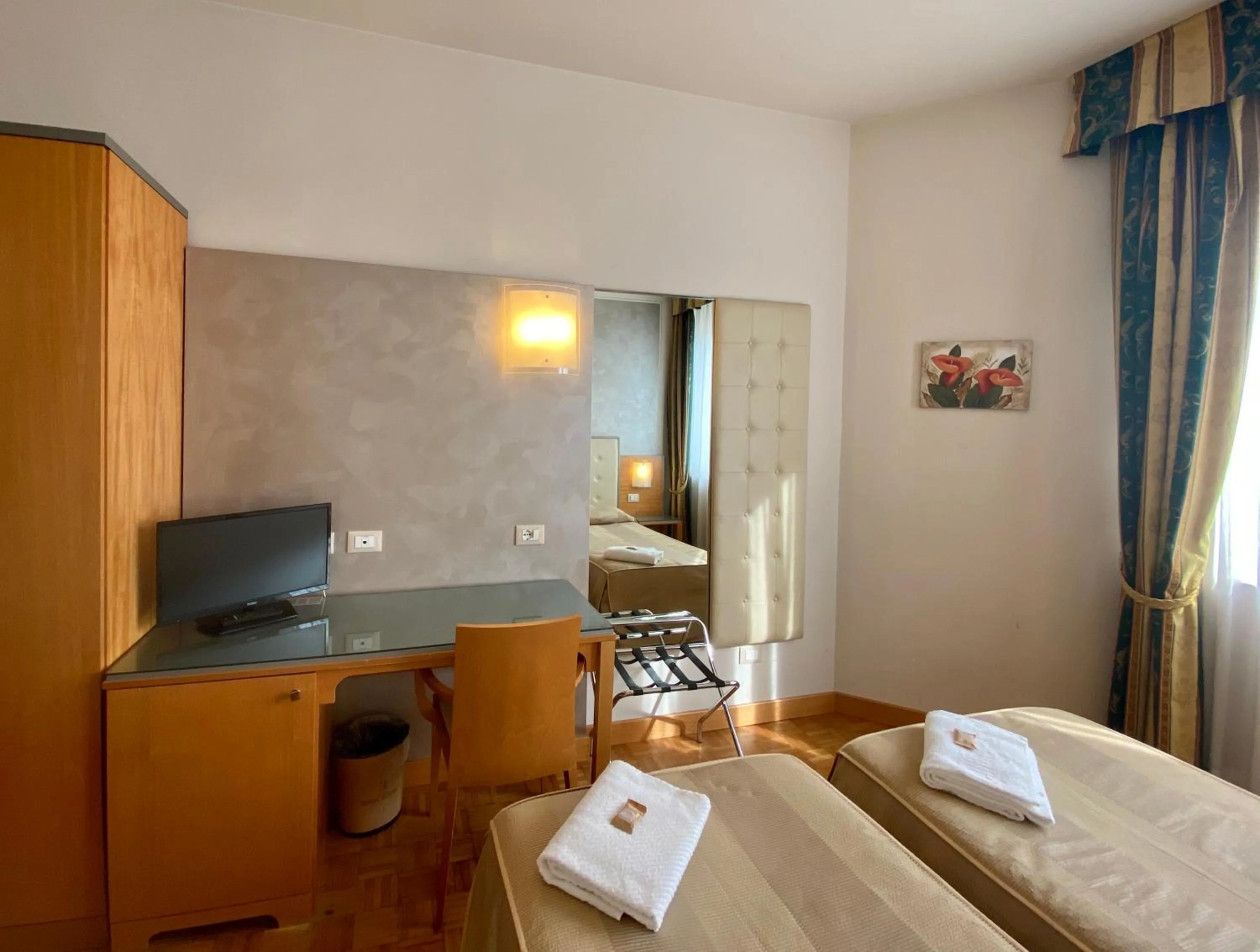 Bed in Hotel Riviera