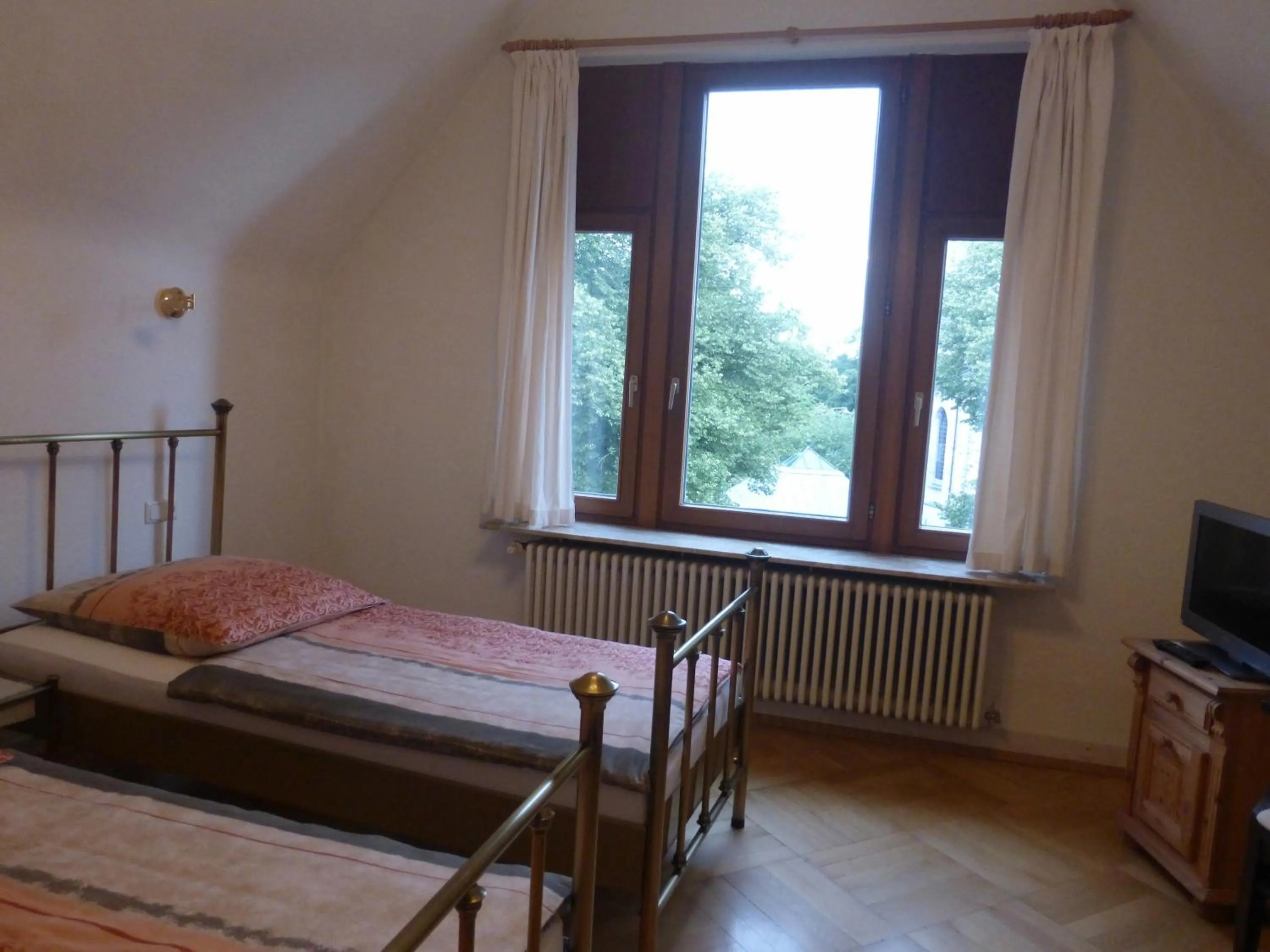 Bed in Hotel Villa Tosca