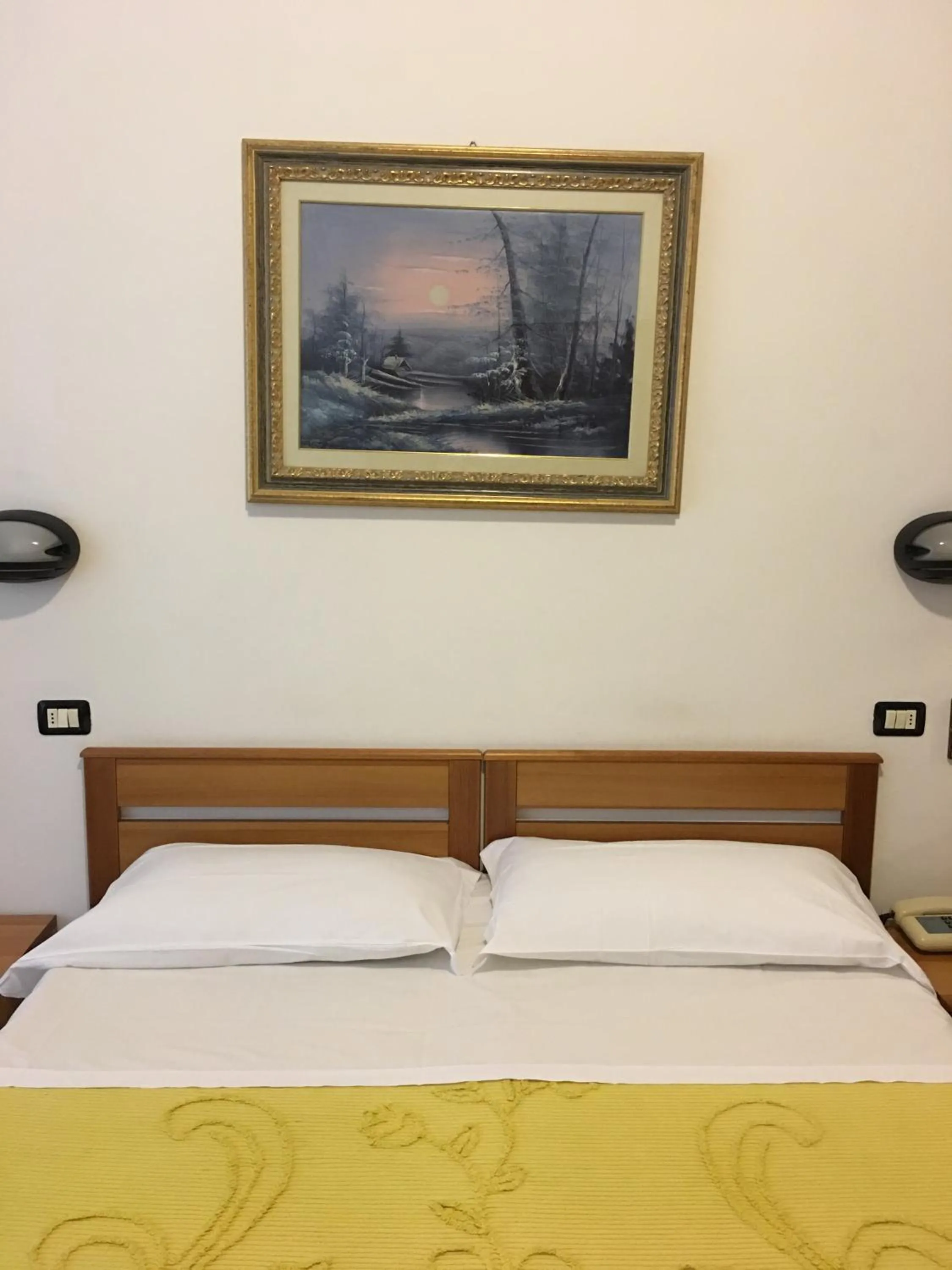 Bed in Hotel Dora