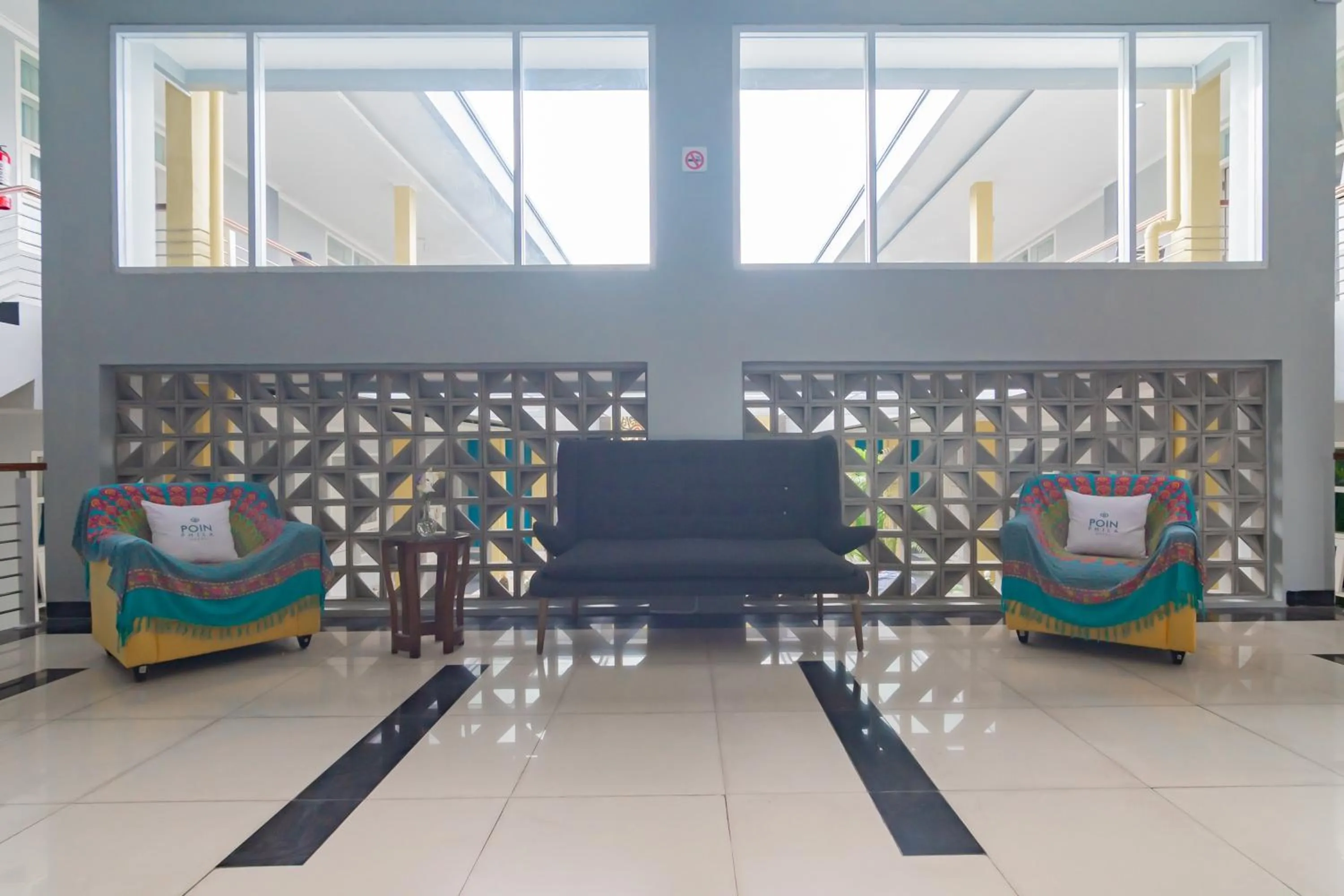 Lobby or reception in RedDoorz Plus @ Point Phila Cihampelas