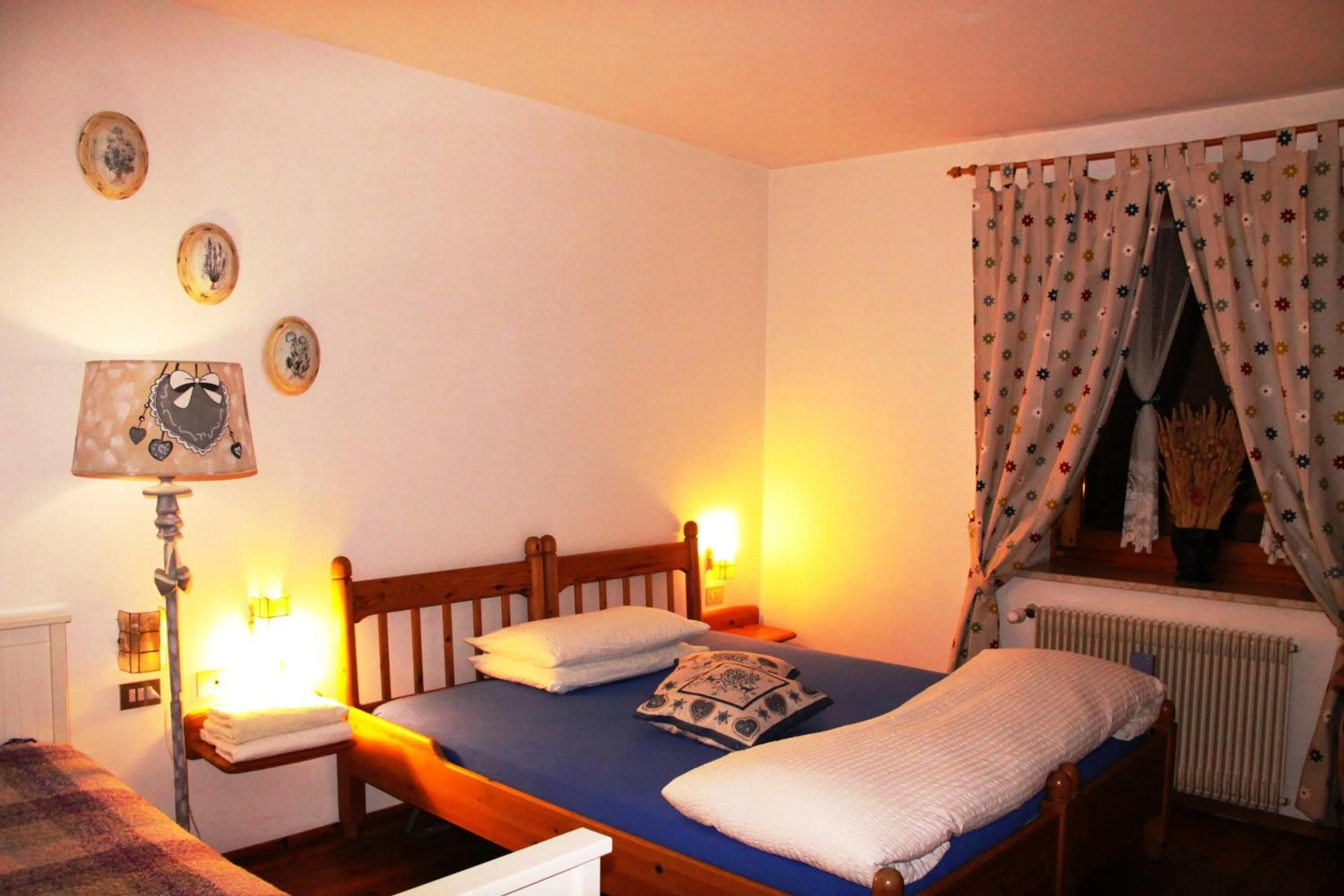 Bed in Garni Biancaneve Ruffrè-Mendola