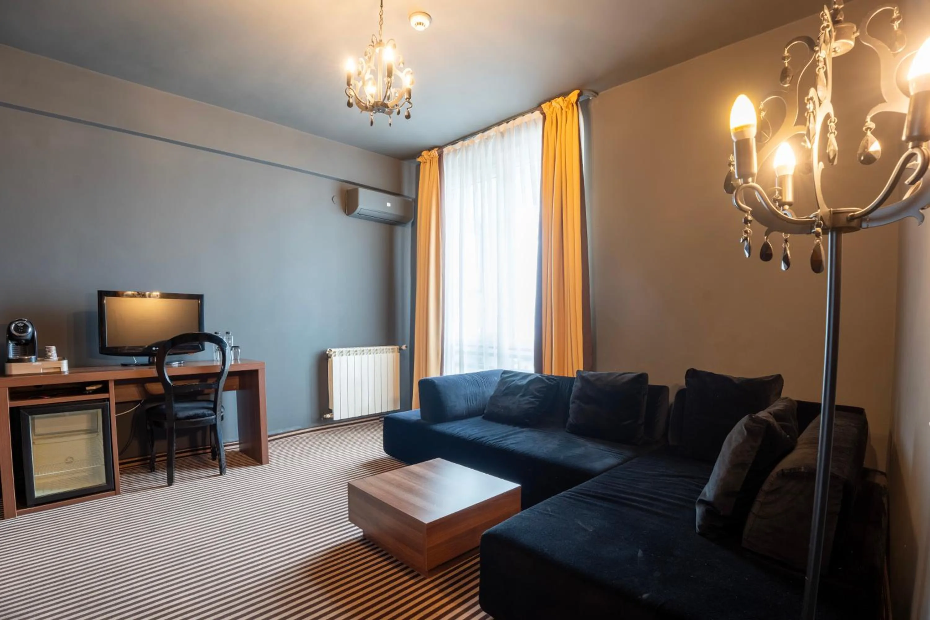 TV and multimedia in Alex&George Boutique Hotel