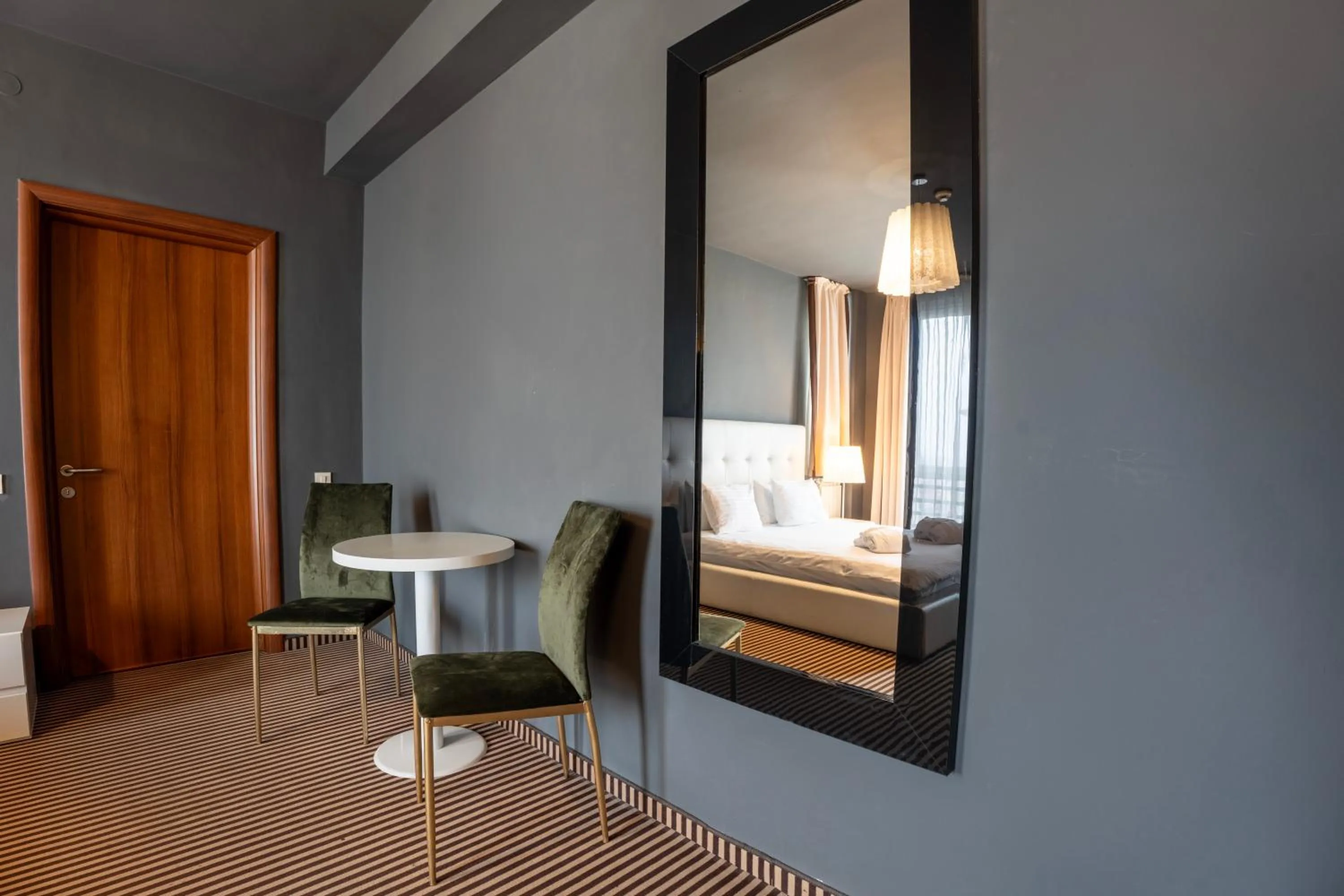 Seating area in Alex&George Boutique Hotel