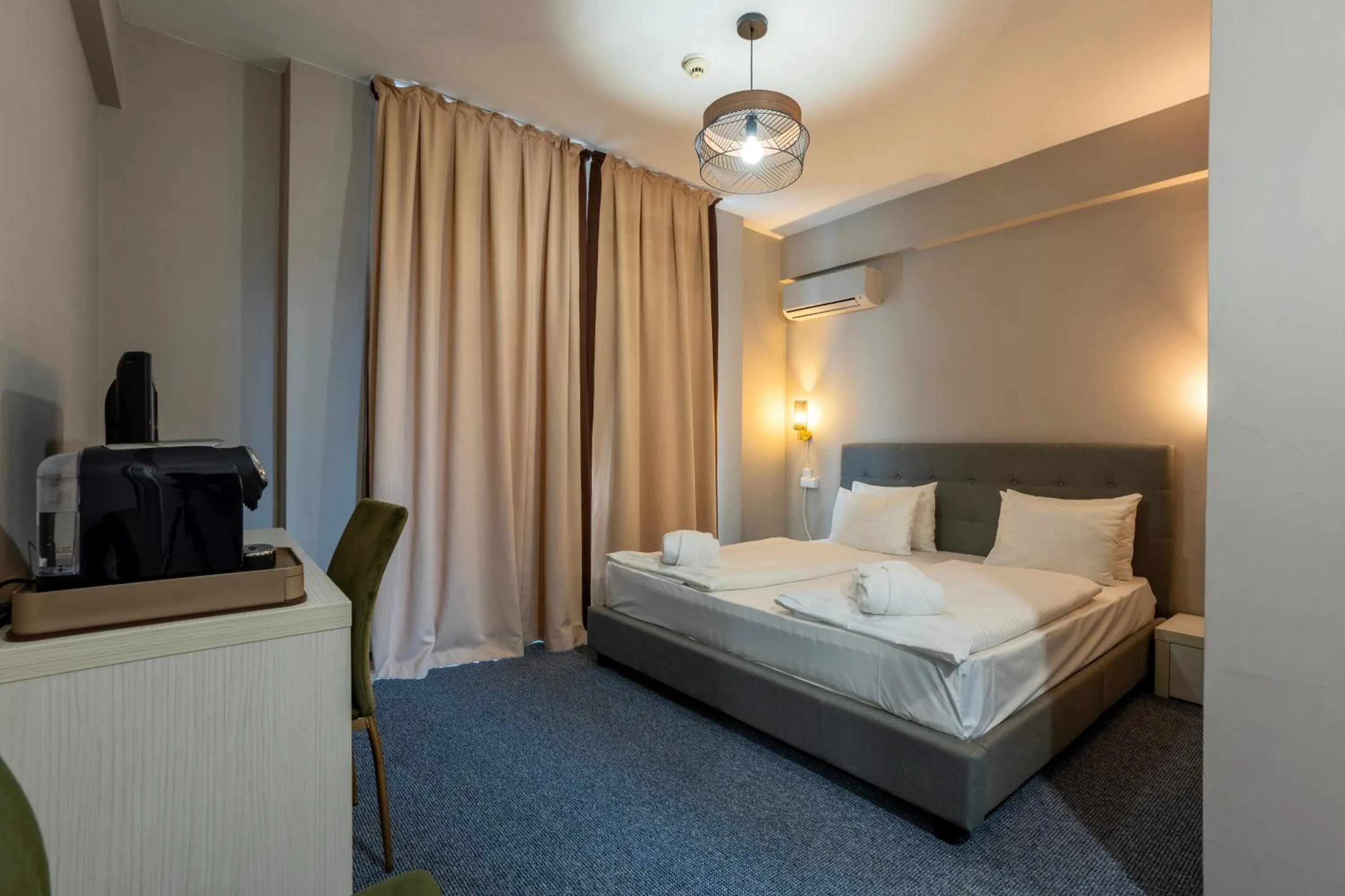 Bedroom in Alex&George Boutique Hotel