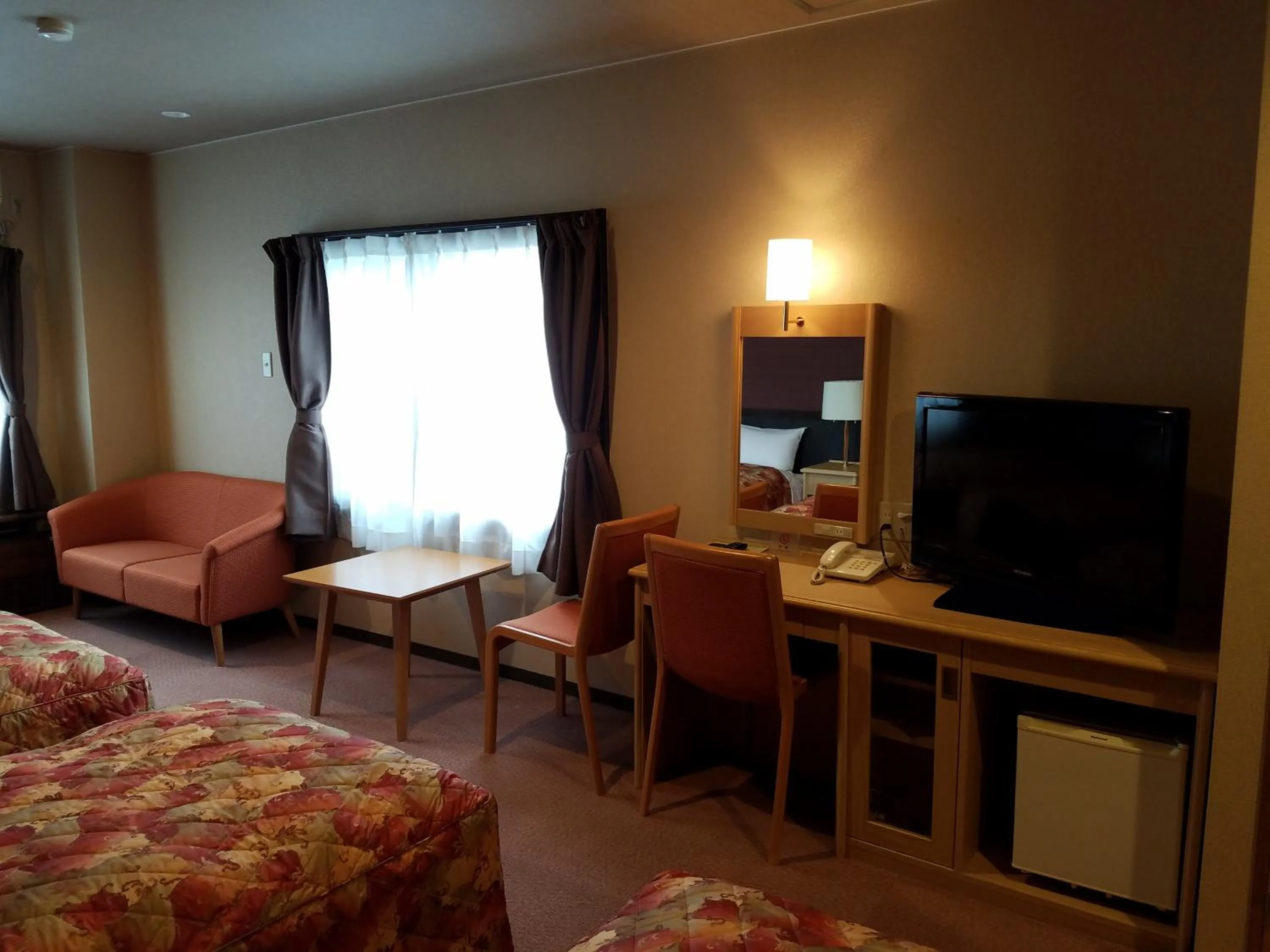 Seating area, Bed in Hakuba Hotel Hana-no-Sato