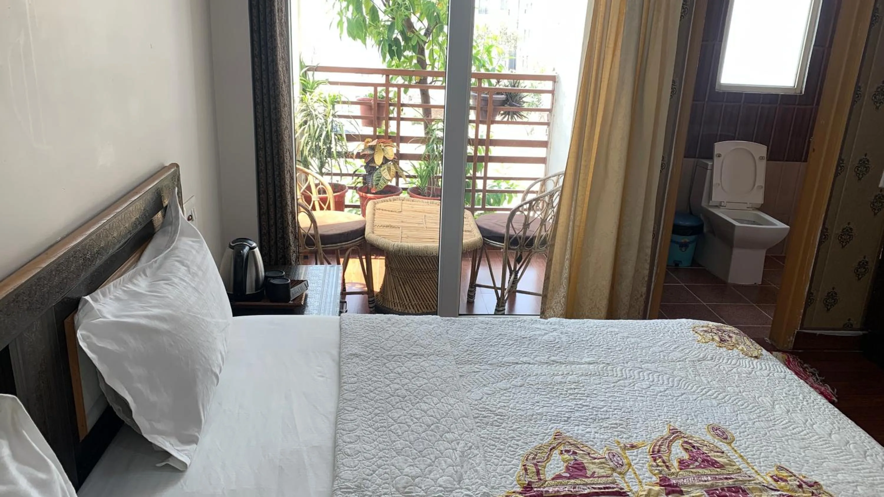 Balcony/Terrace, Bed in Rudram Hotel Yoga & Ayurveda Retreat