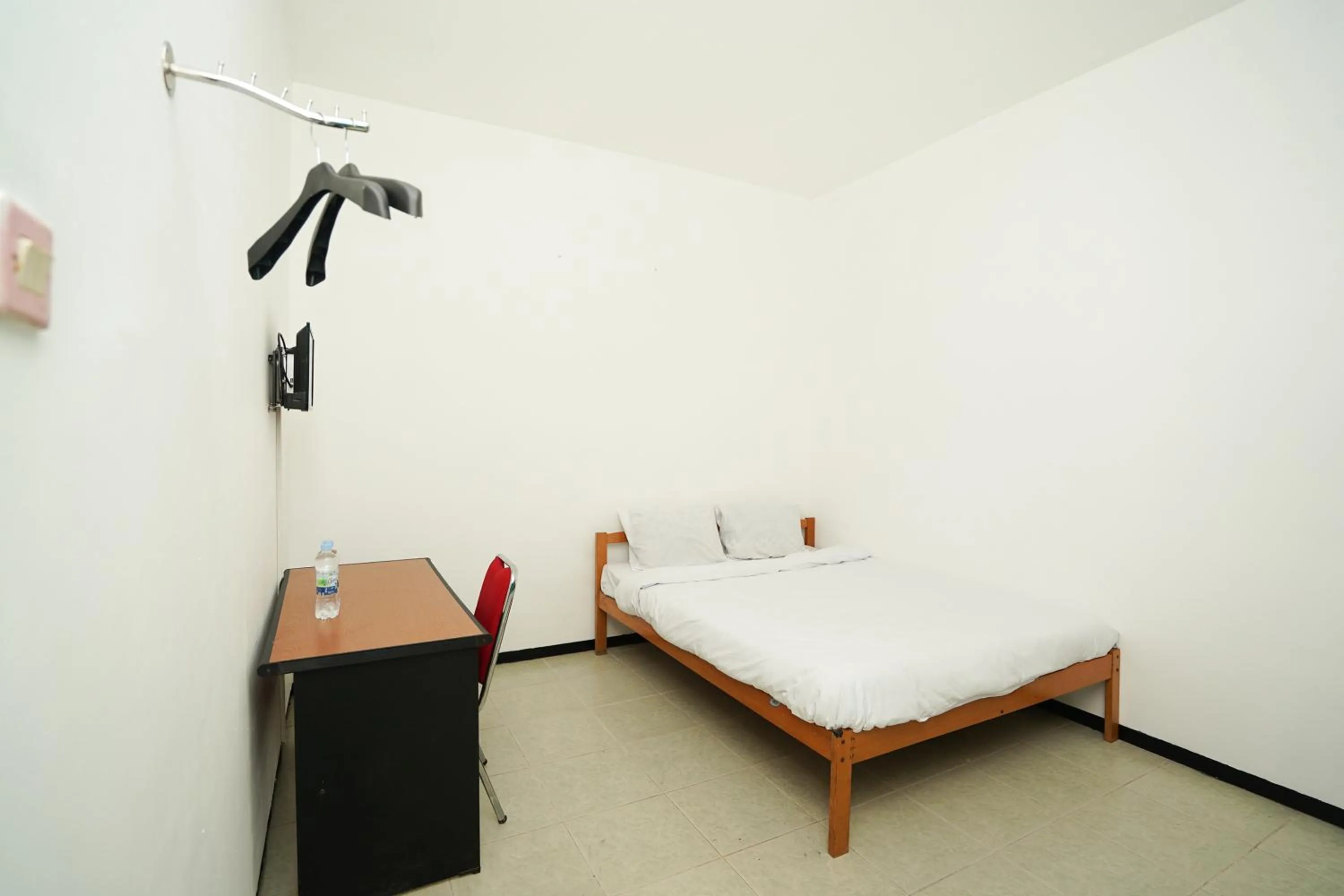 Bedroom, Bed in Merapi Inn Syariah by ecommerceloka