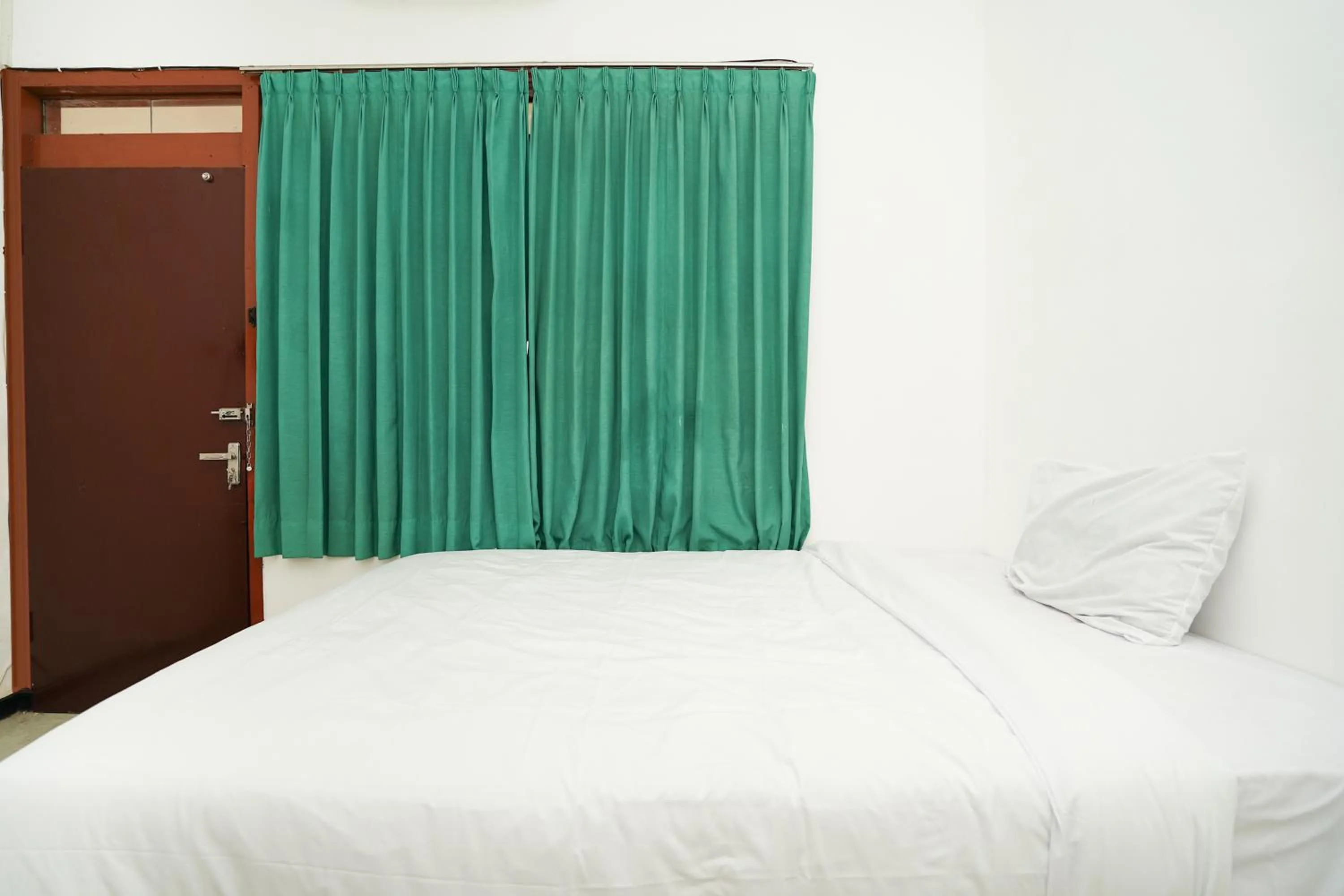 Bedroom, Bed in Merapi Inn Syariah by ecommerceloka