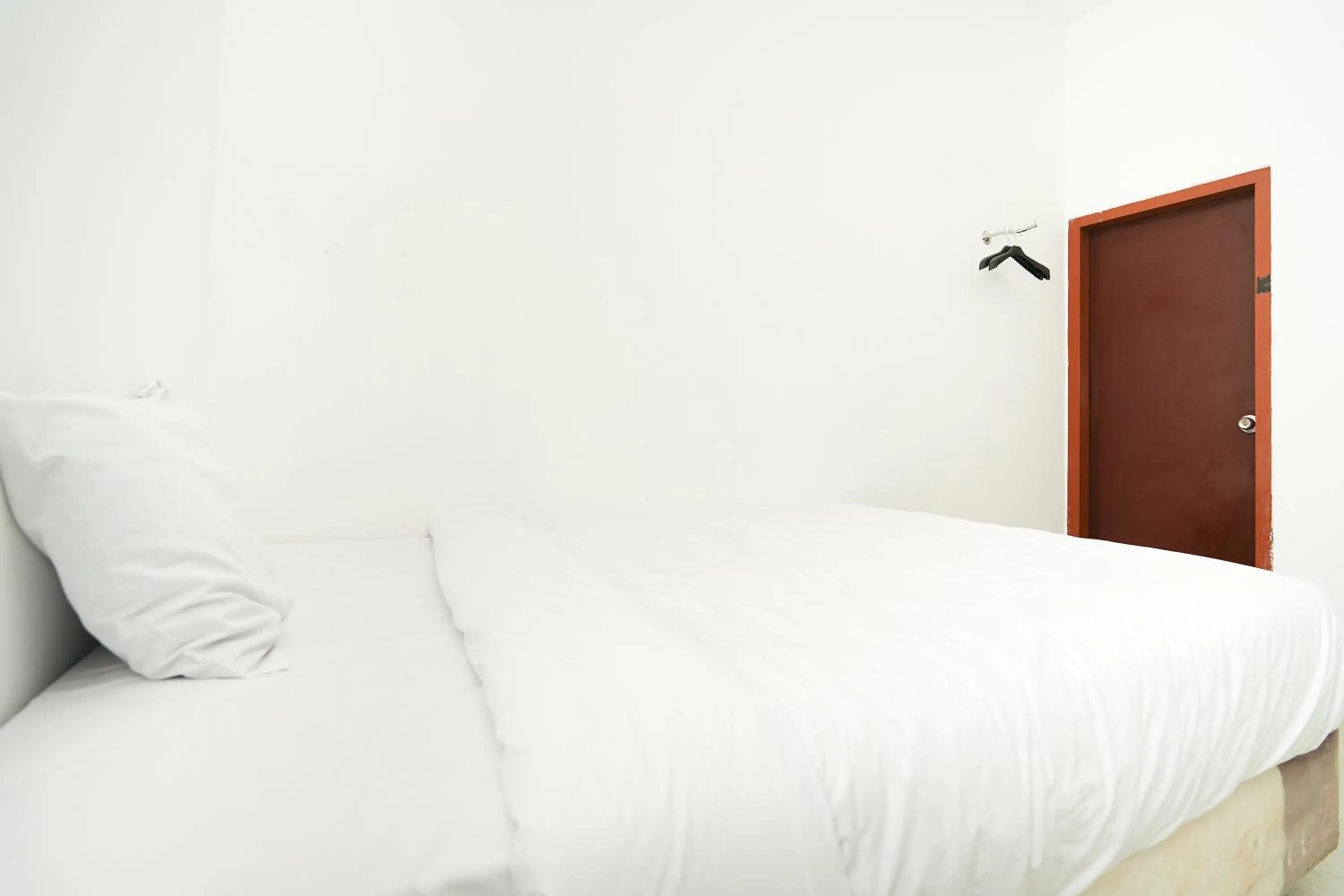 Bedroom, Bed in Merapi Inn Syariah by ecommerceloka