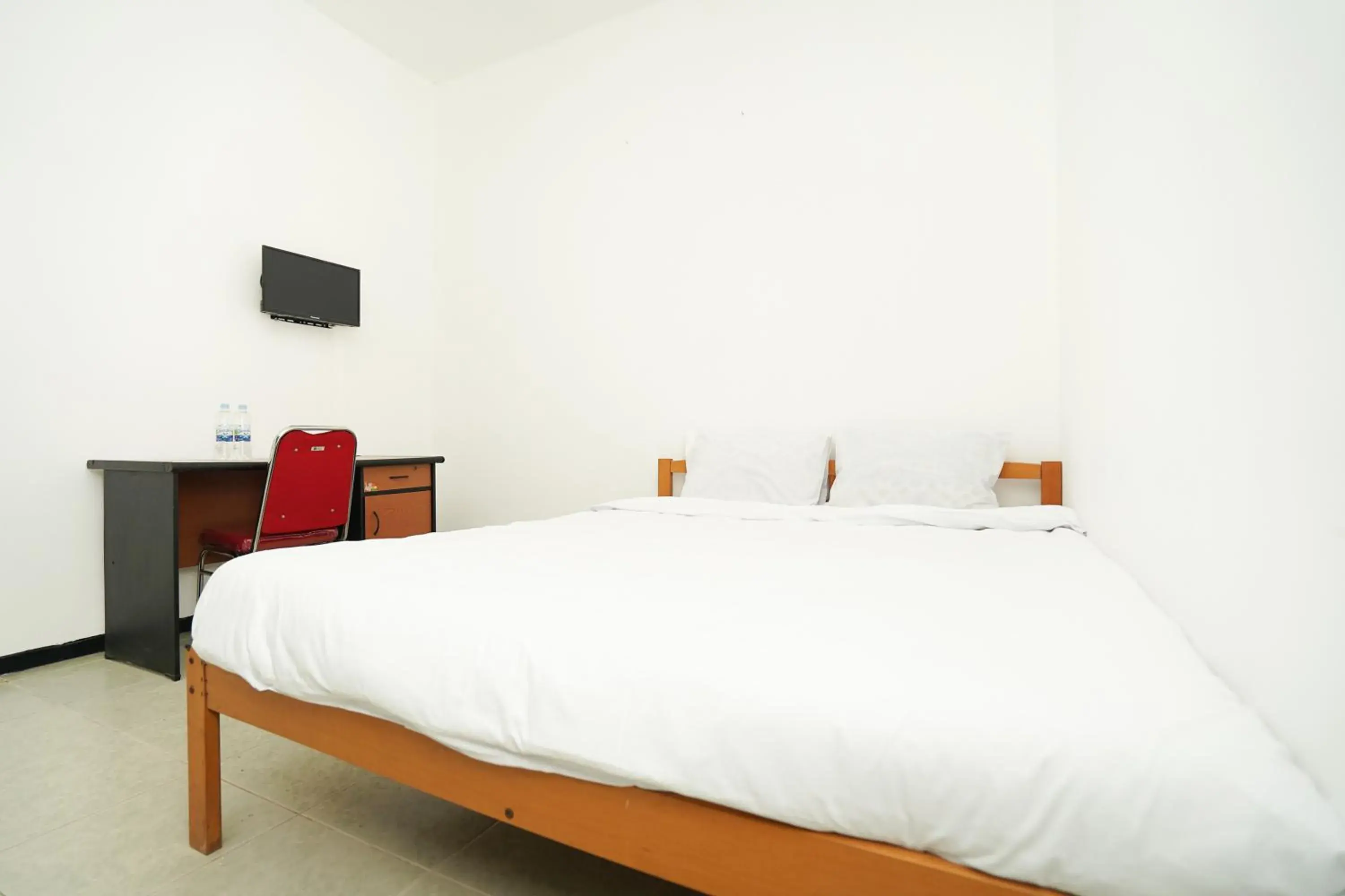 Standard Double Room in Merapi Inn Syariah by ecommerceloka Standard Double Room in Merapi Inn Syariah by ecommerceloka