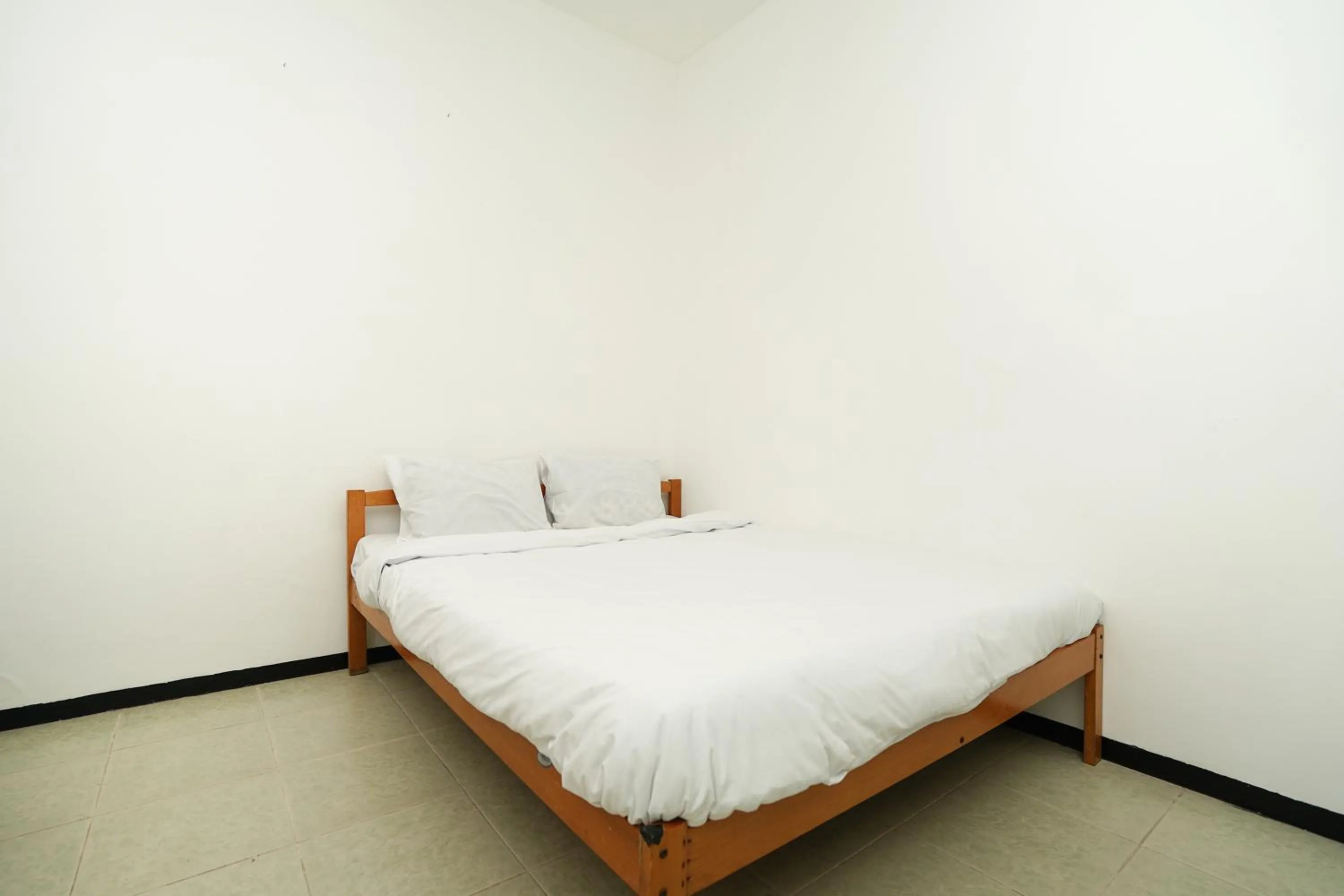 Bedroom, Bed in Merapi Inn Syariah by ecommerceloka