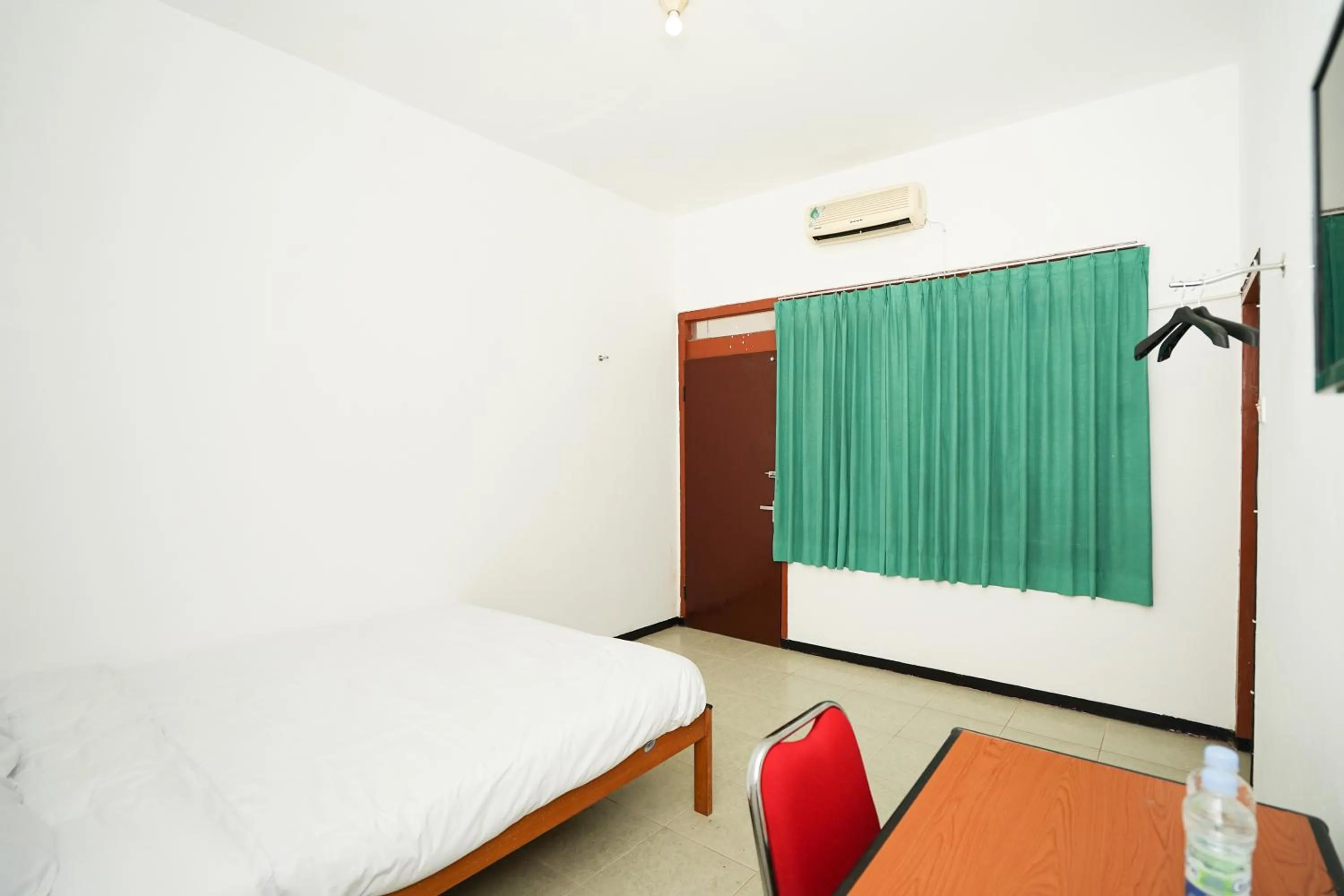 Bed in Merapi Inn Syariah by ecommerceloka