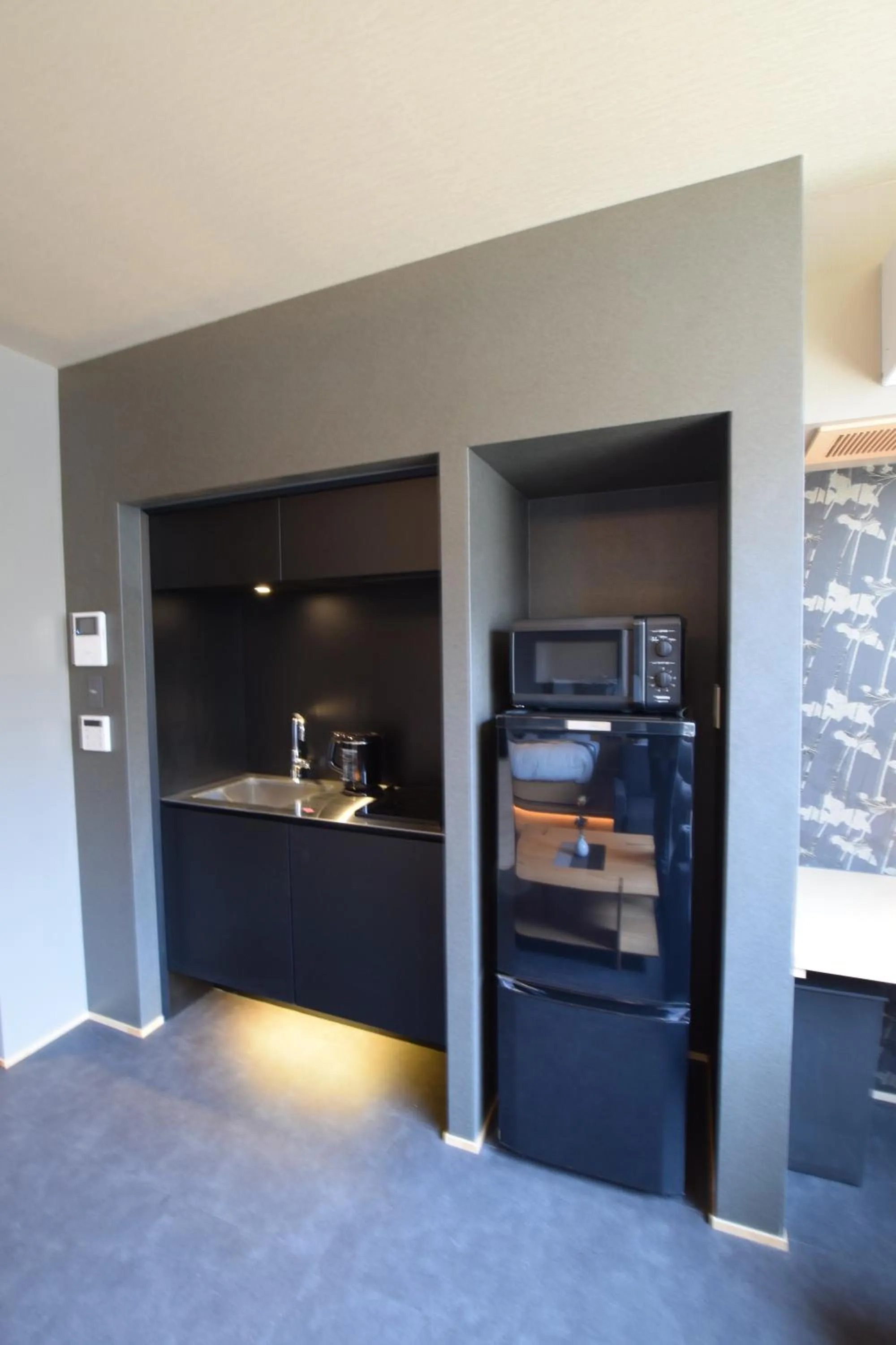 Kitchen or kitchenette in GRAND BASE Beppu Ekimae