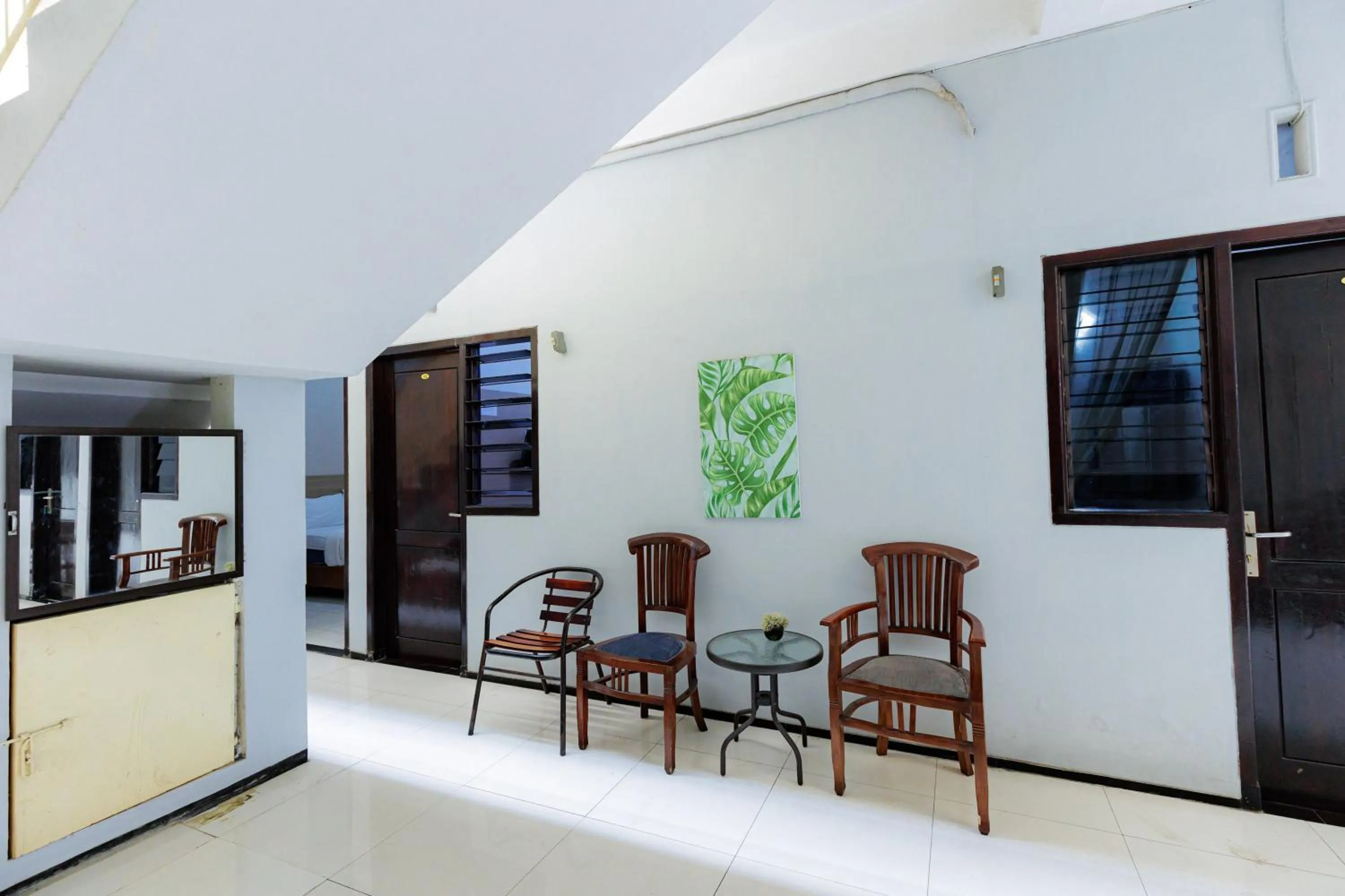 Seating area in RedDoorz Plus near Malang Town Square