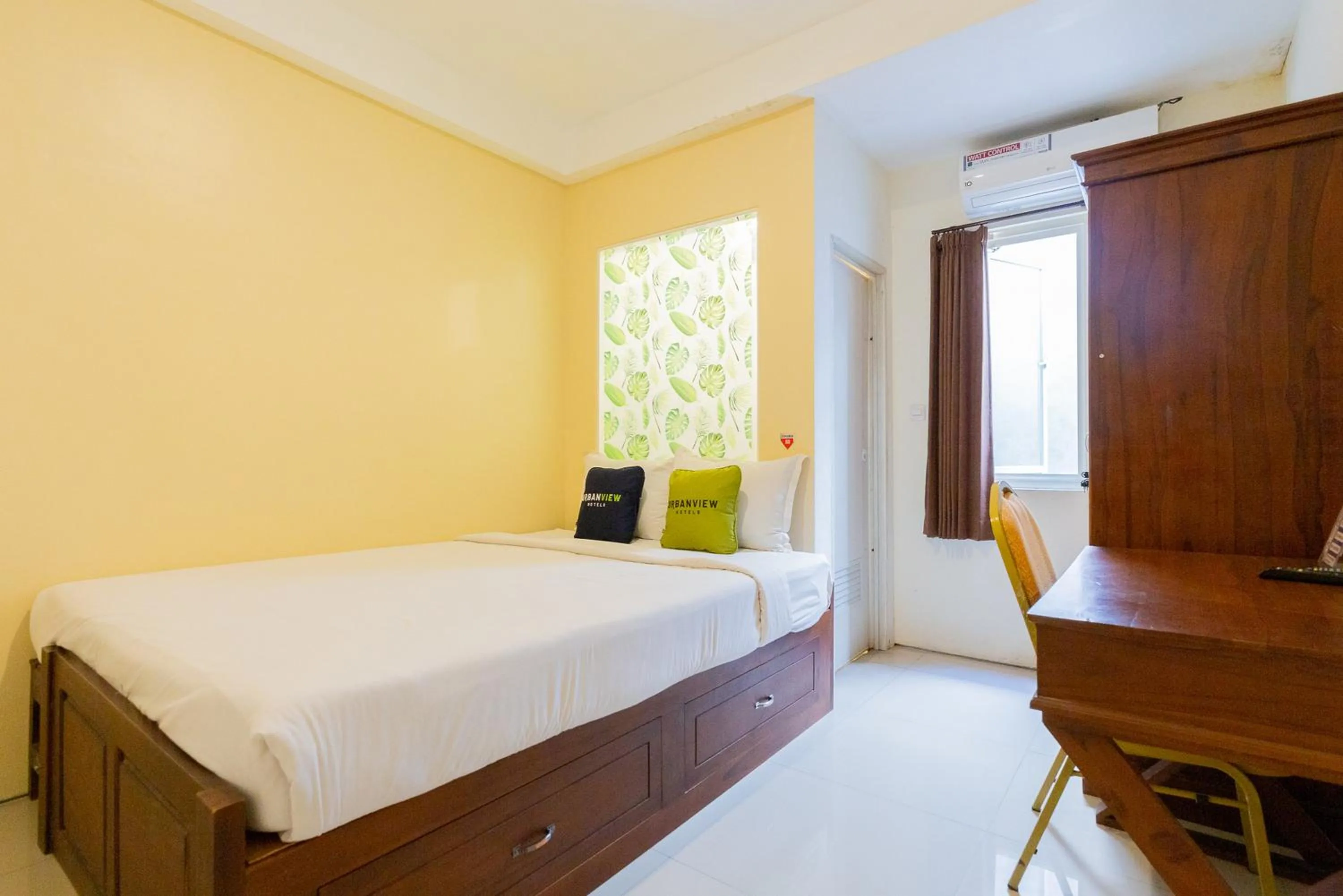 Bed in Urbanview Erga Family Residence Syariah Surabaya by RedDoorz