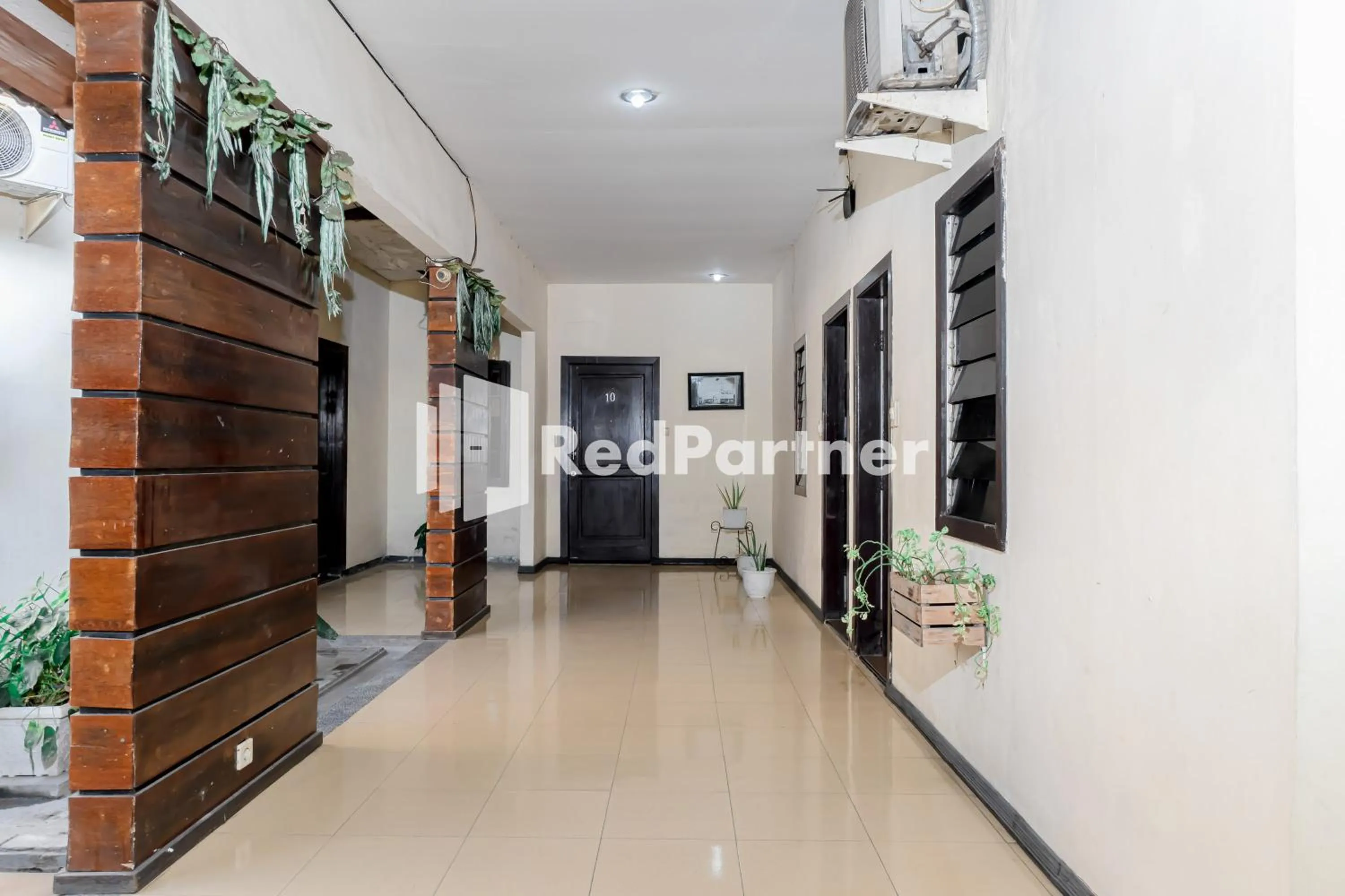 Area and facilities in Cherry Pink Hotel Medan Mitra RedDoorz