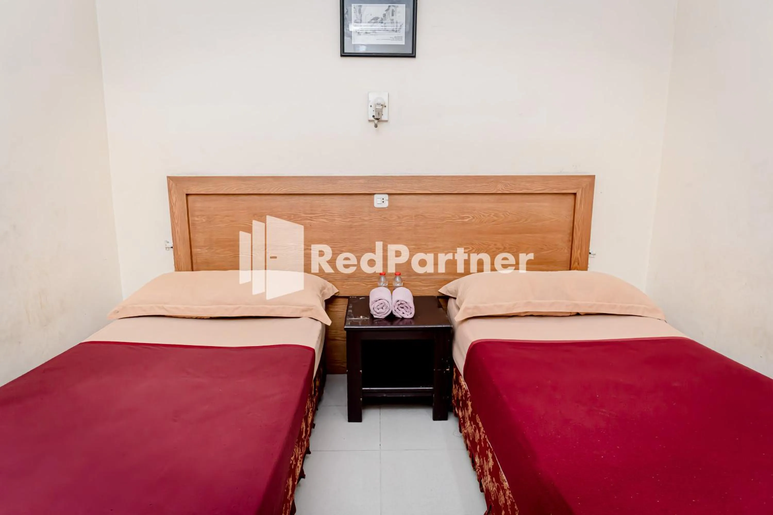 Bedroom, Bed in Cherry Pink Hotel Medan Mitra RedDoorz