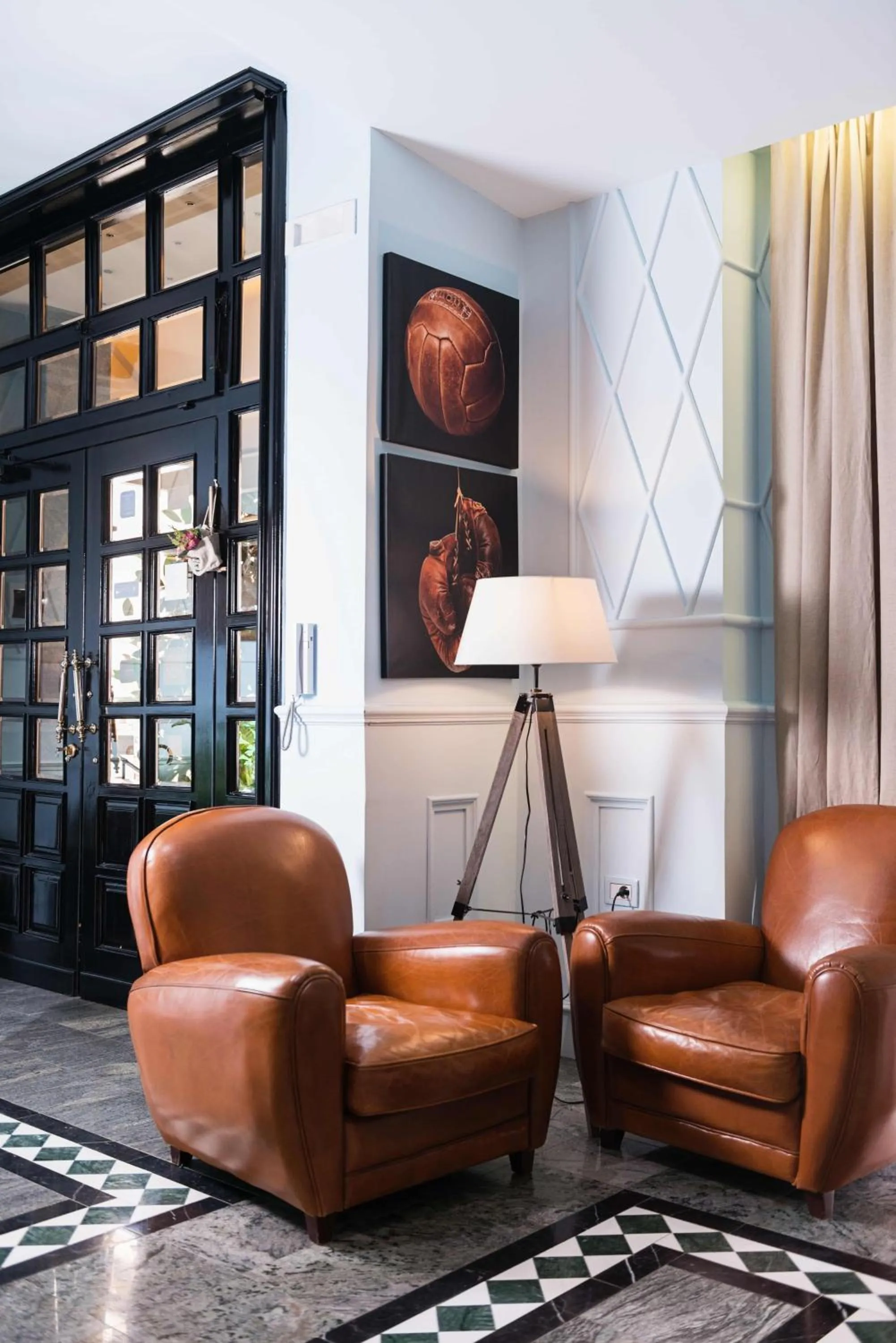 Communal lounge/ TV room in Areela Boutique Hotel