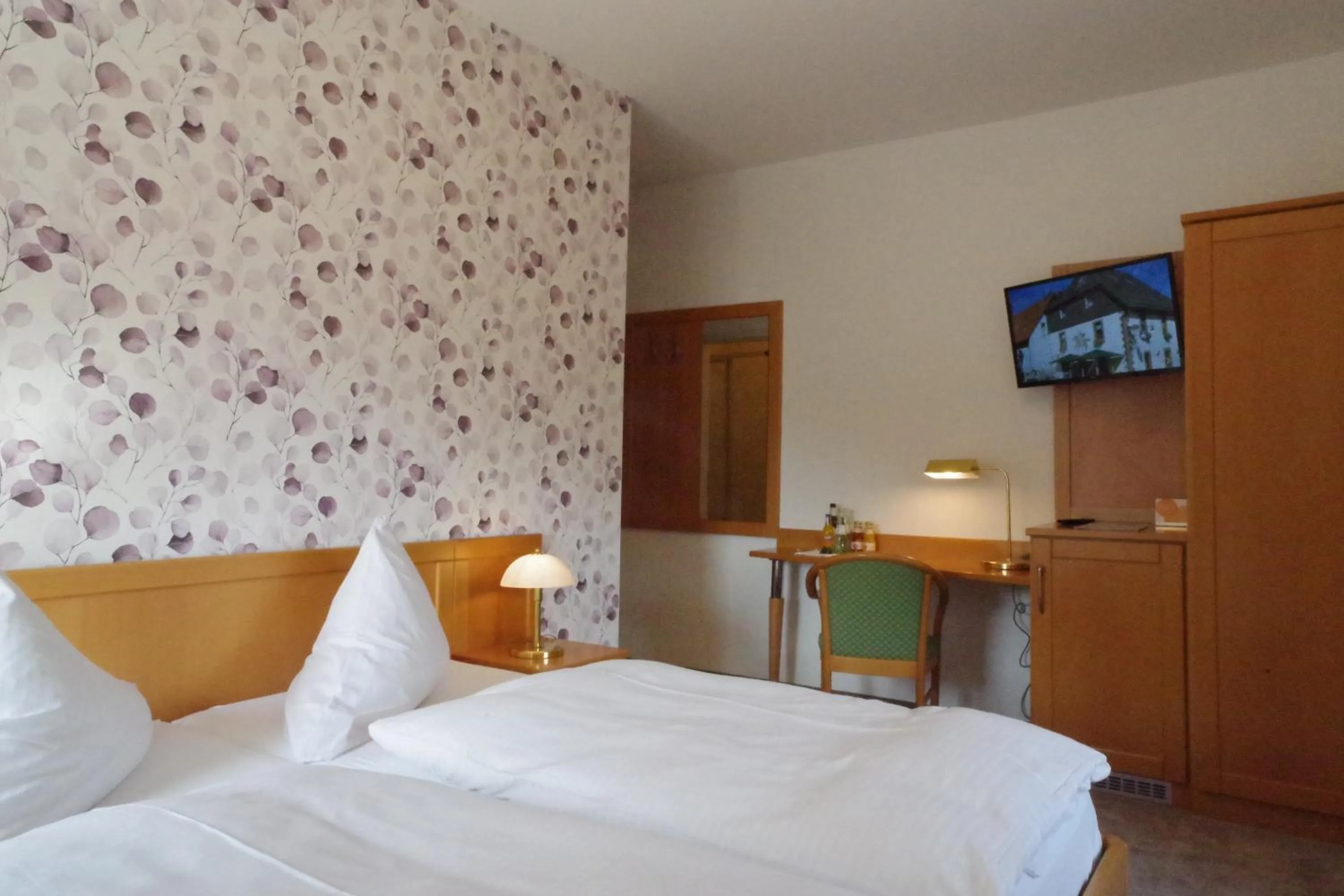 Bed in Land-gut-Hotel Räuber Lippoldskrug