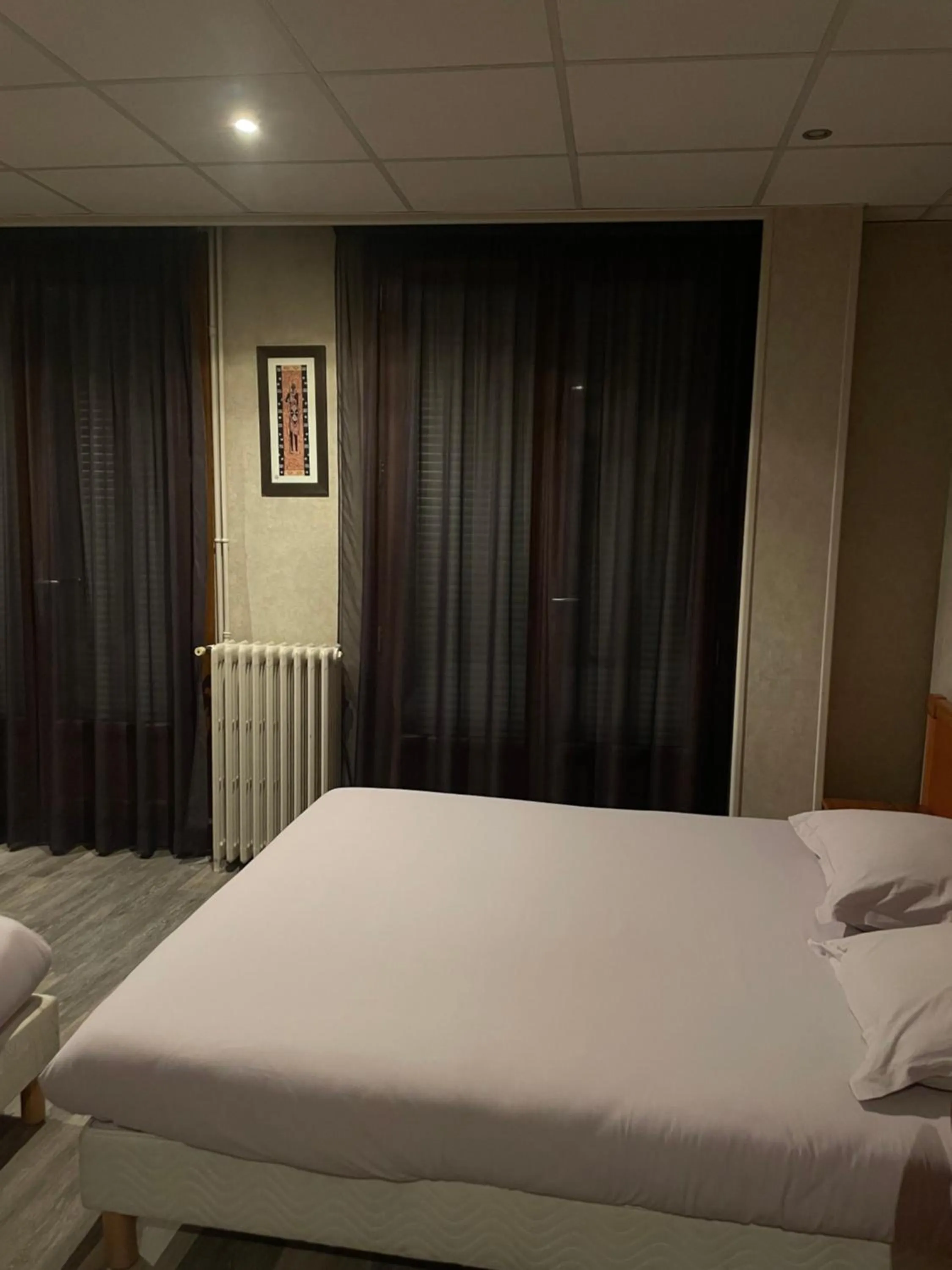 Bed in Hôtel de l'Europe