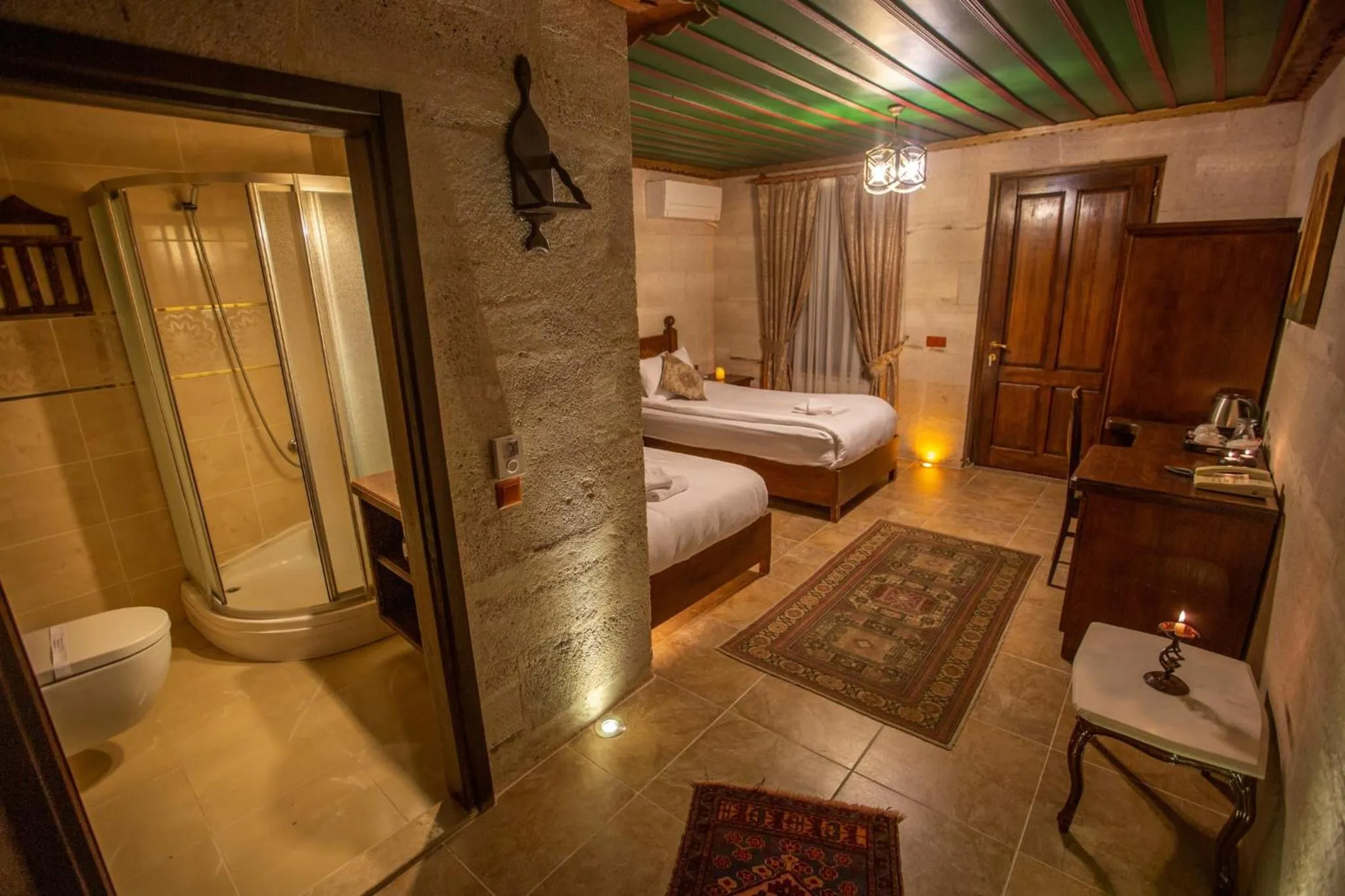 Bed in Hermes Cave Hotel