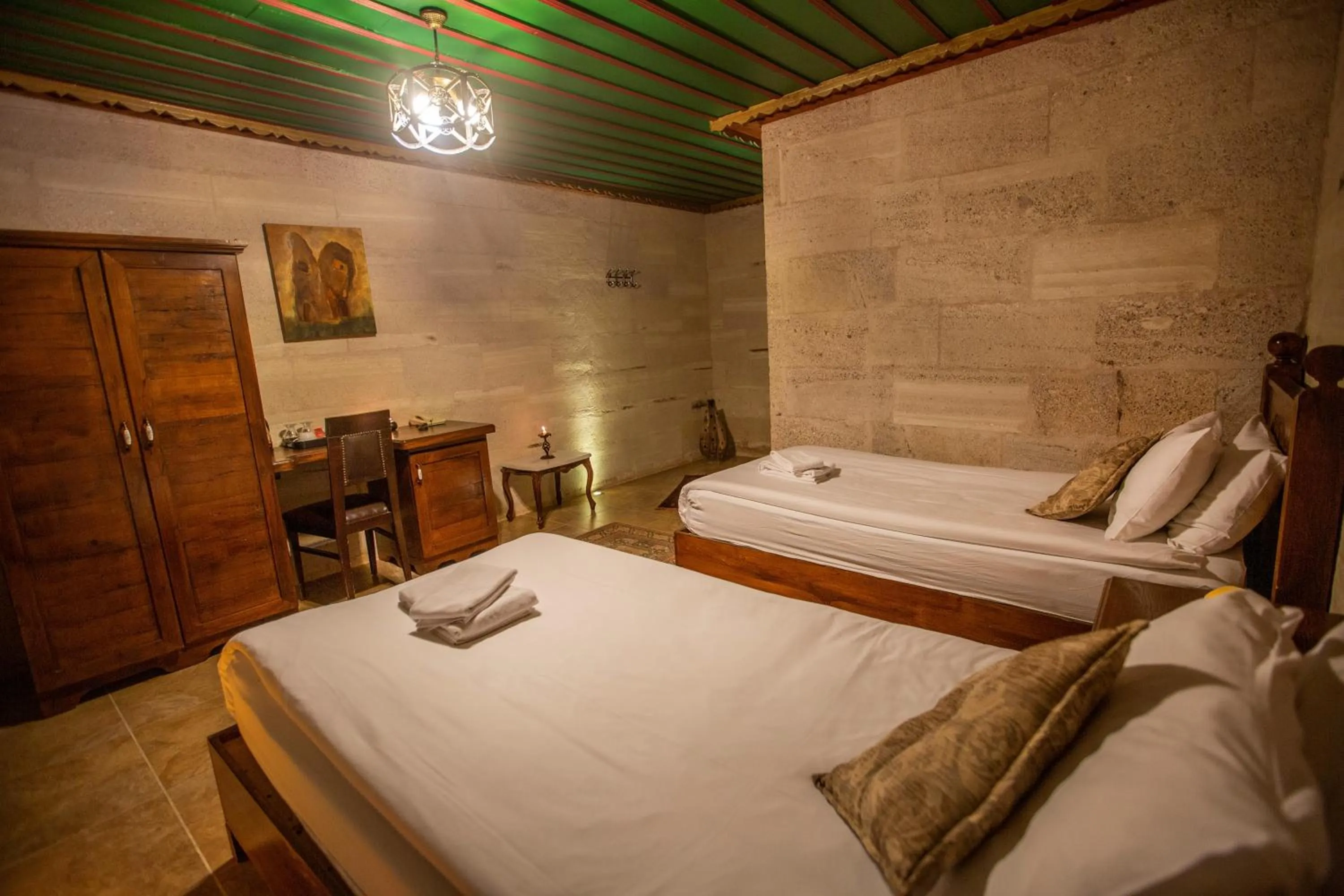 Bed in Hermes Cave Hotel