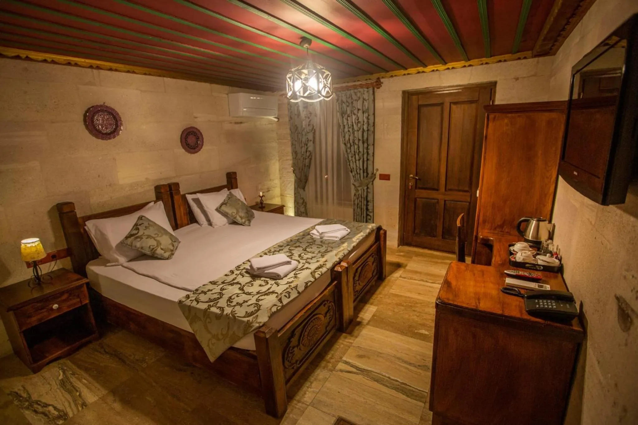 Bed in Hermes Cave Hotel