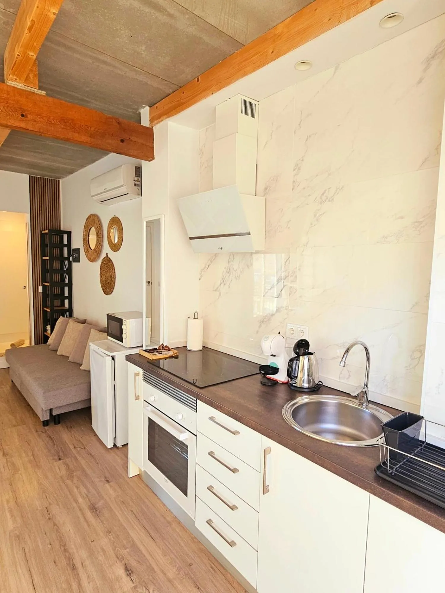 Kitchen or kitchenette in Apartamentos de la Huerta