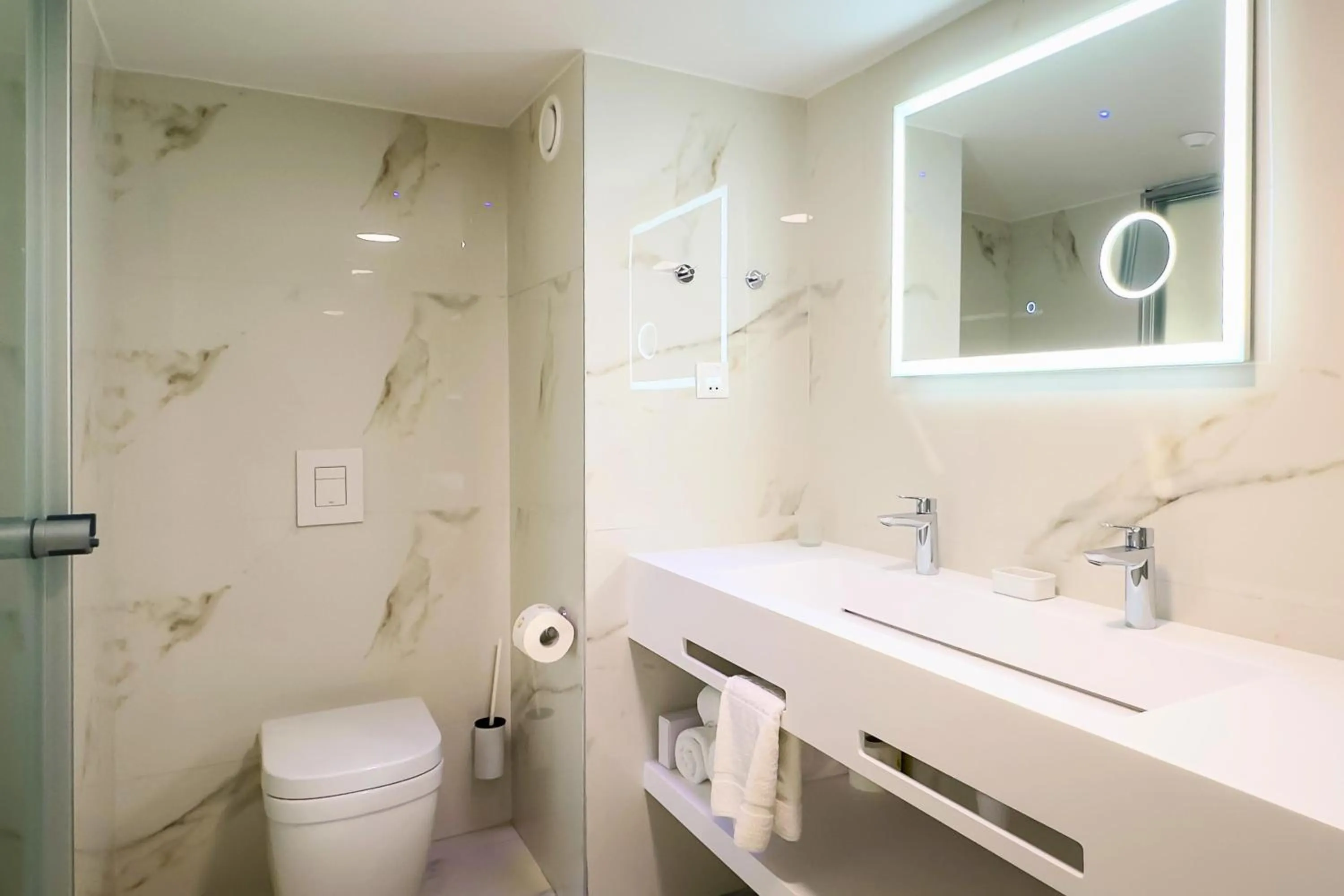 Shower in Cavo Maris Beach Hotel