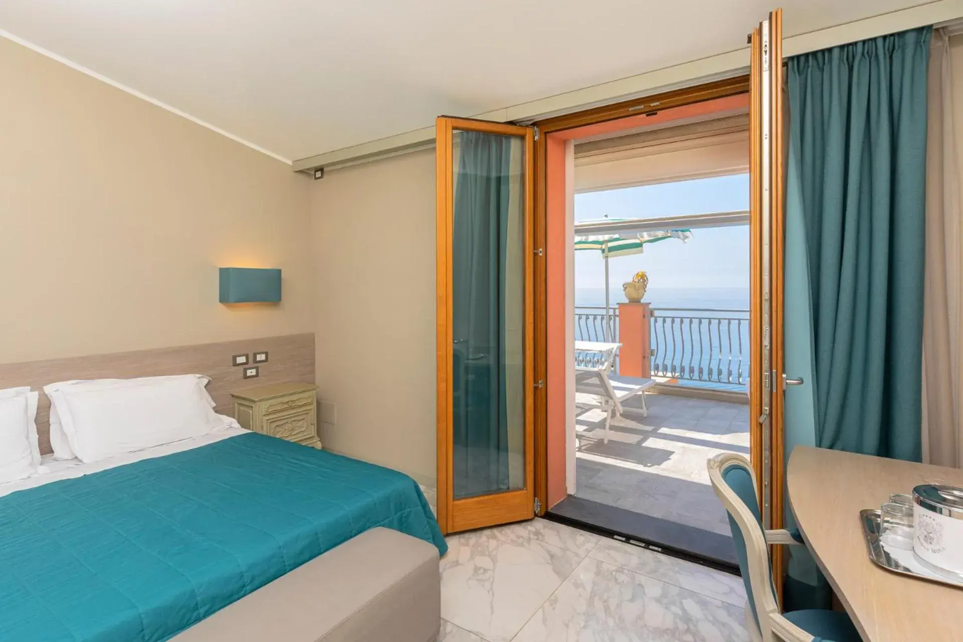 Junior Suite with Terrace and Sea View in Hotel Porto Roca Junior Suite with Terrace and Sea View in Hotel Porto Roca