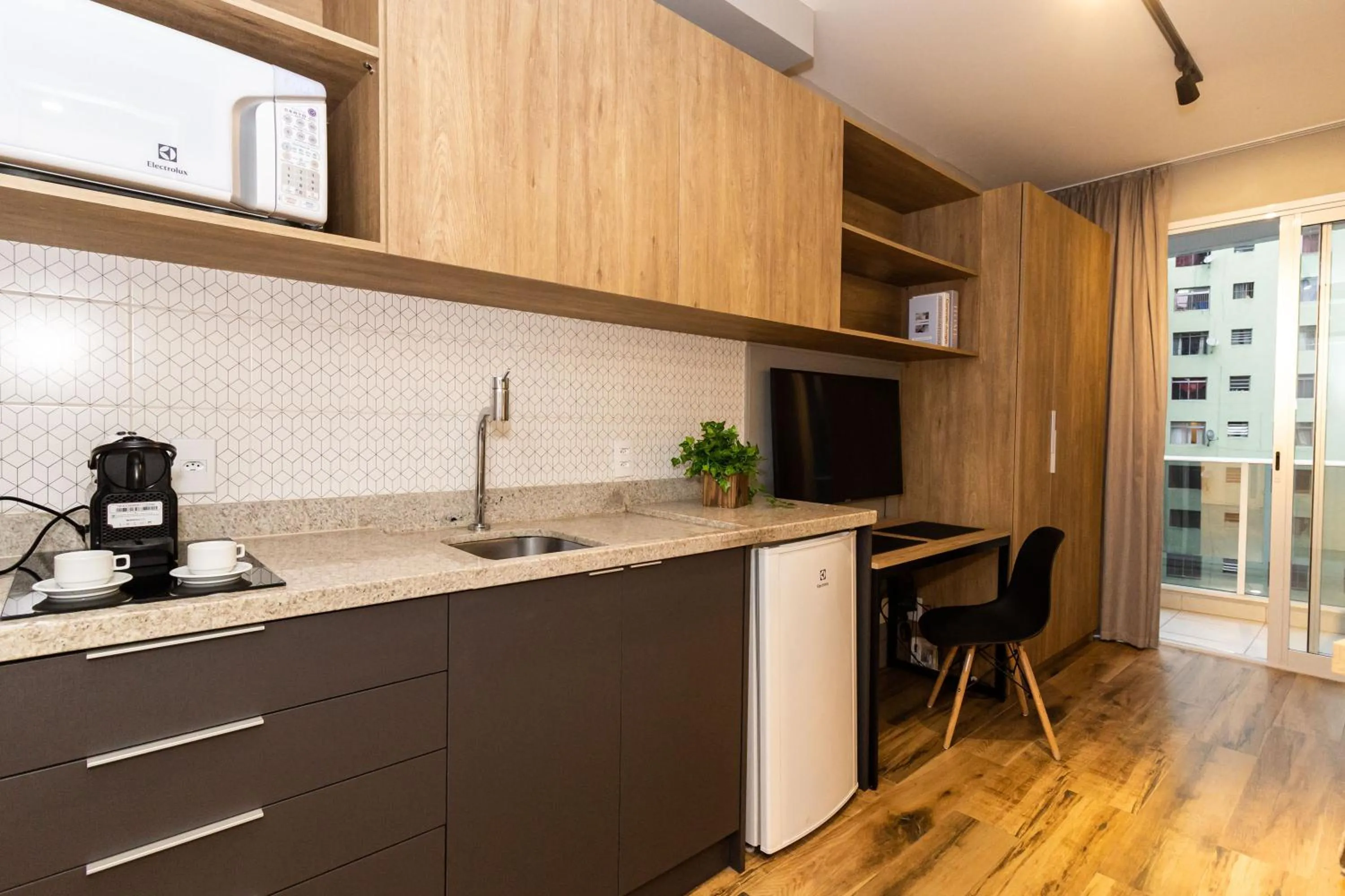 Kitchen or kitchenette in 360 Suítes Sé