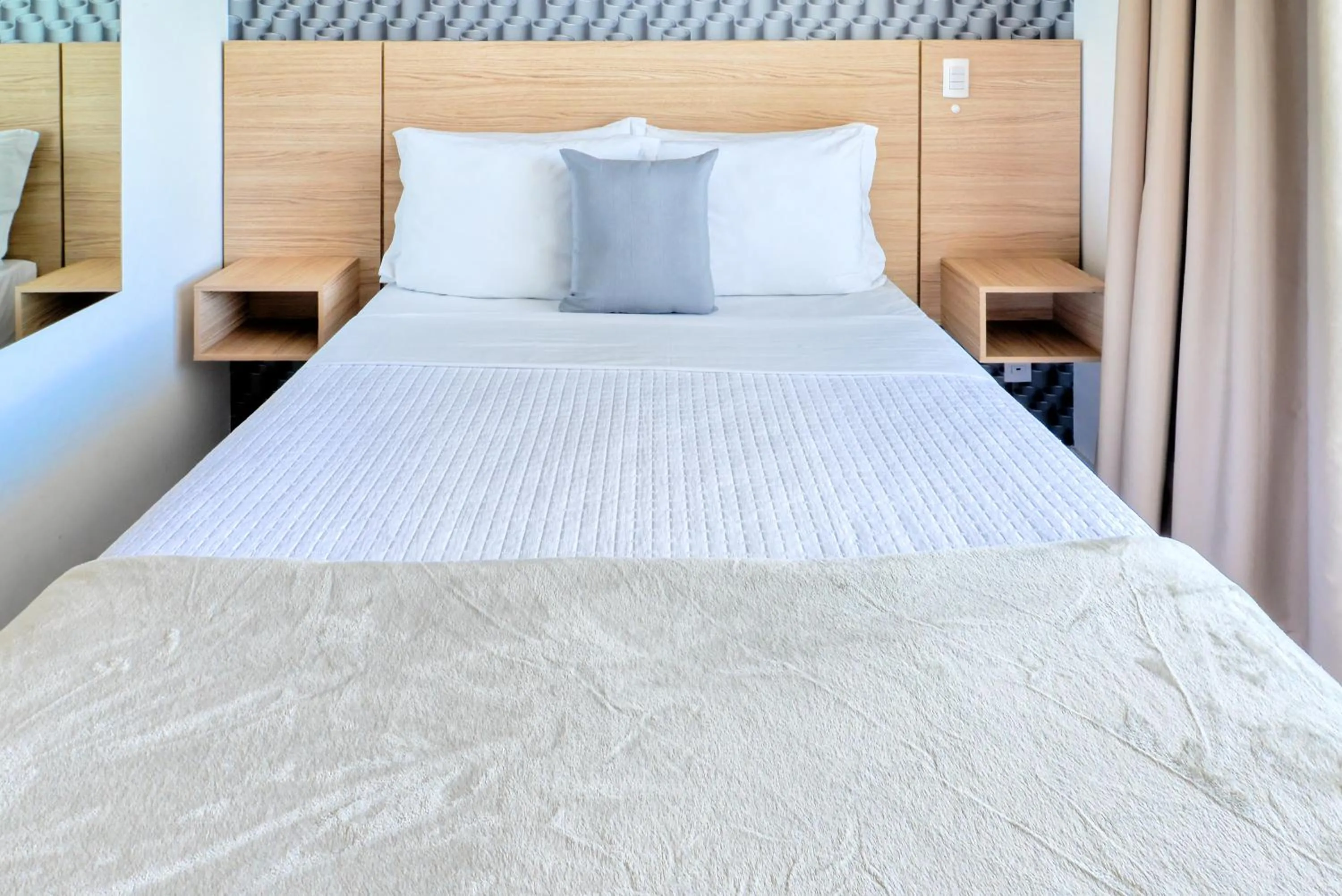 Bed in 360 Suítes Sé