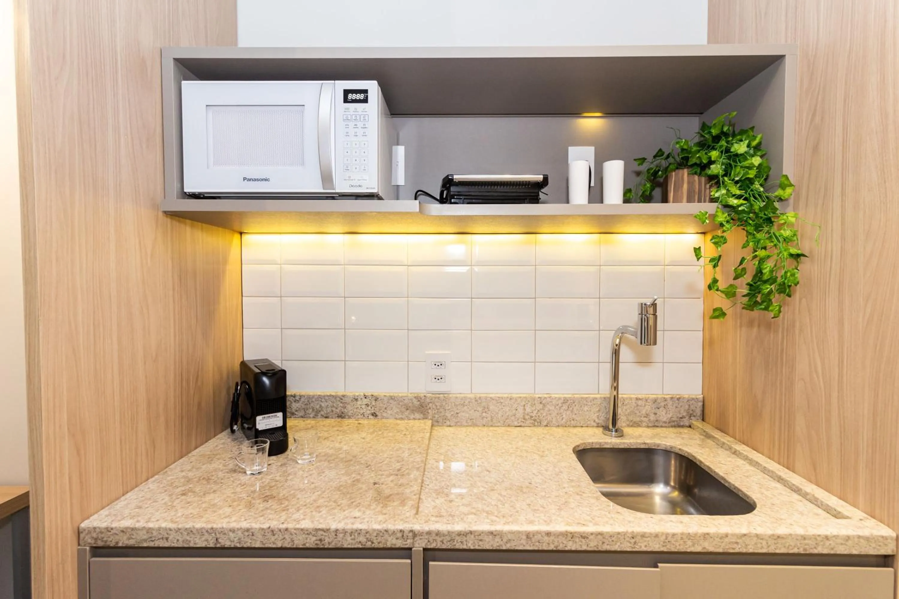 Kitchen or kitchenette in 360 Suítes Sé