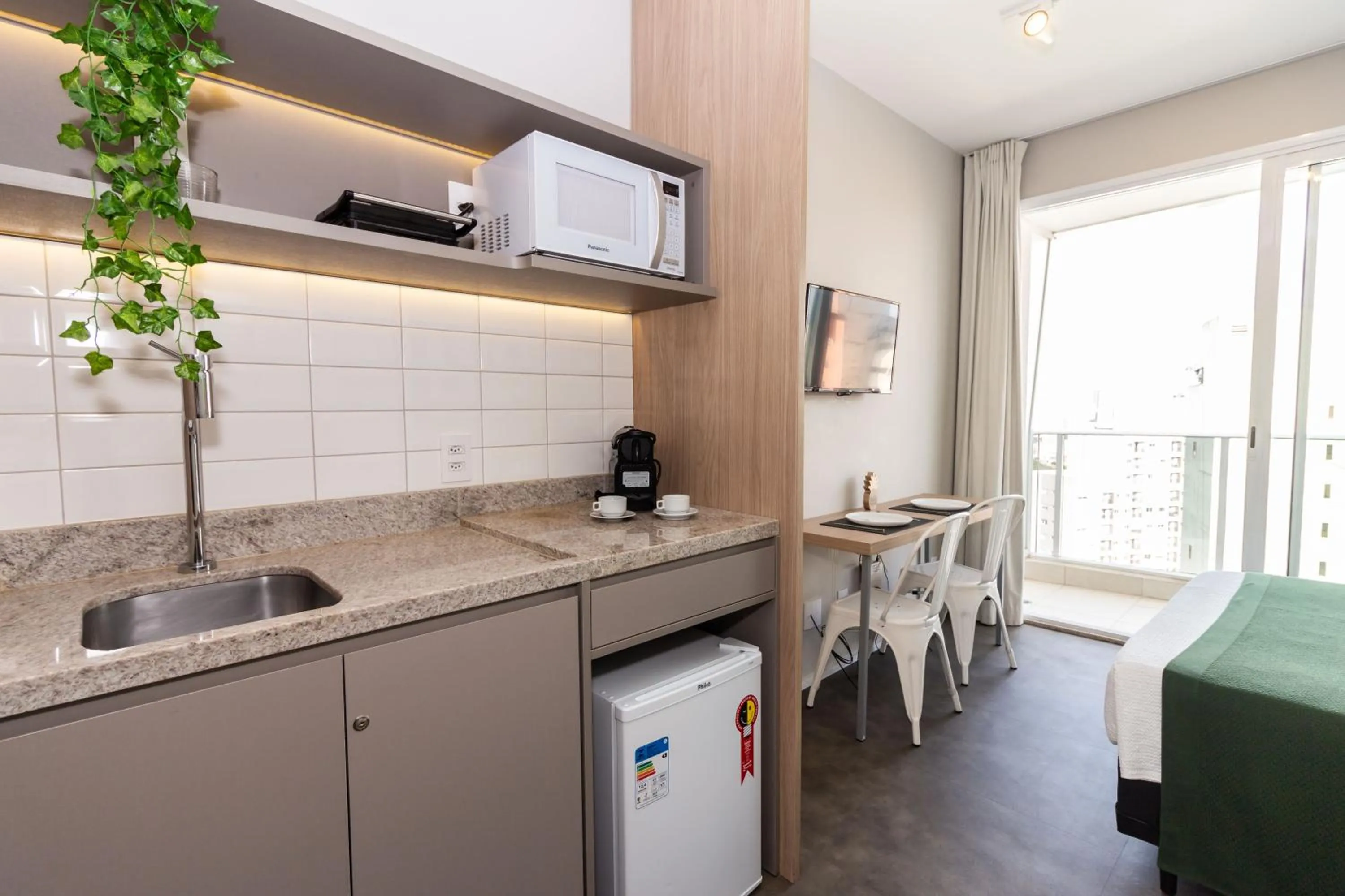 Kitchen or kitchenette in 360 Suítes Sé