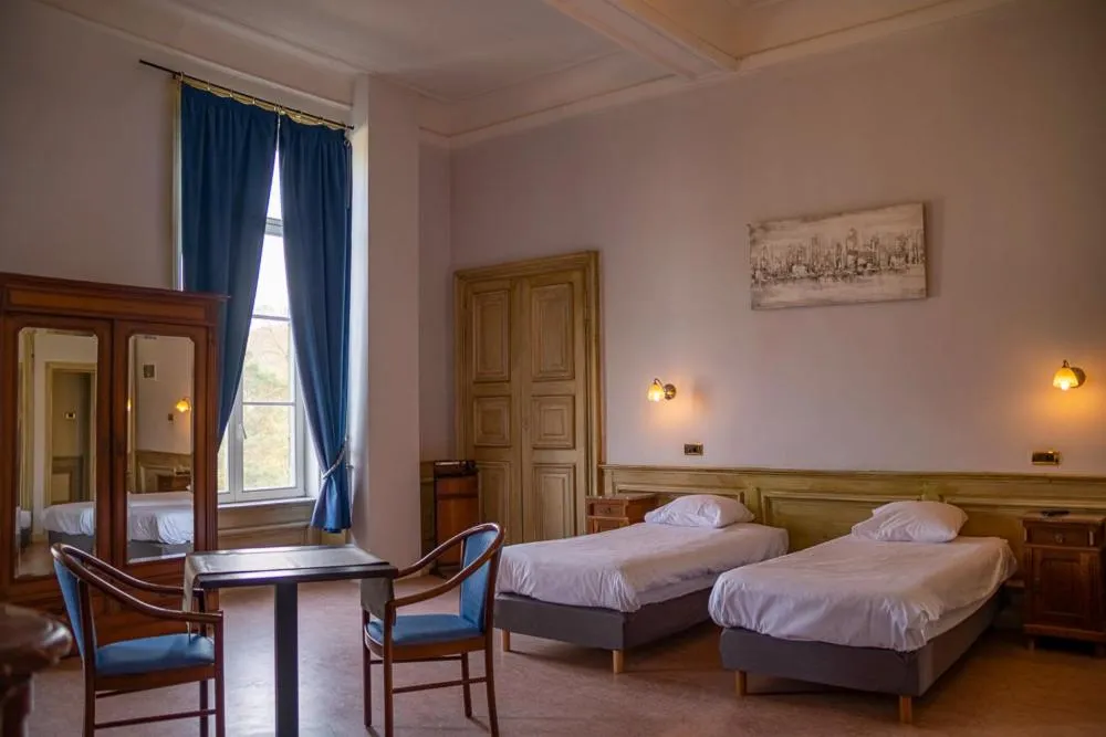 Photo of the whole room, Bed in Domaine Du Chateau De La Neuville