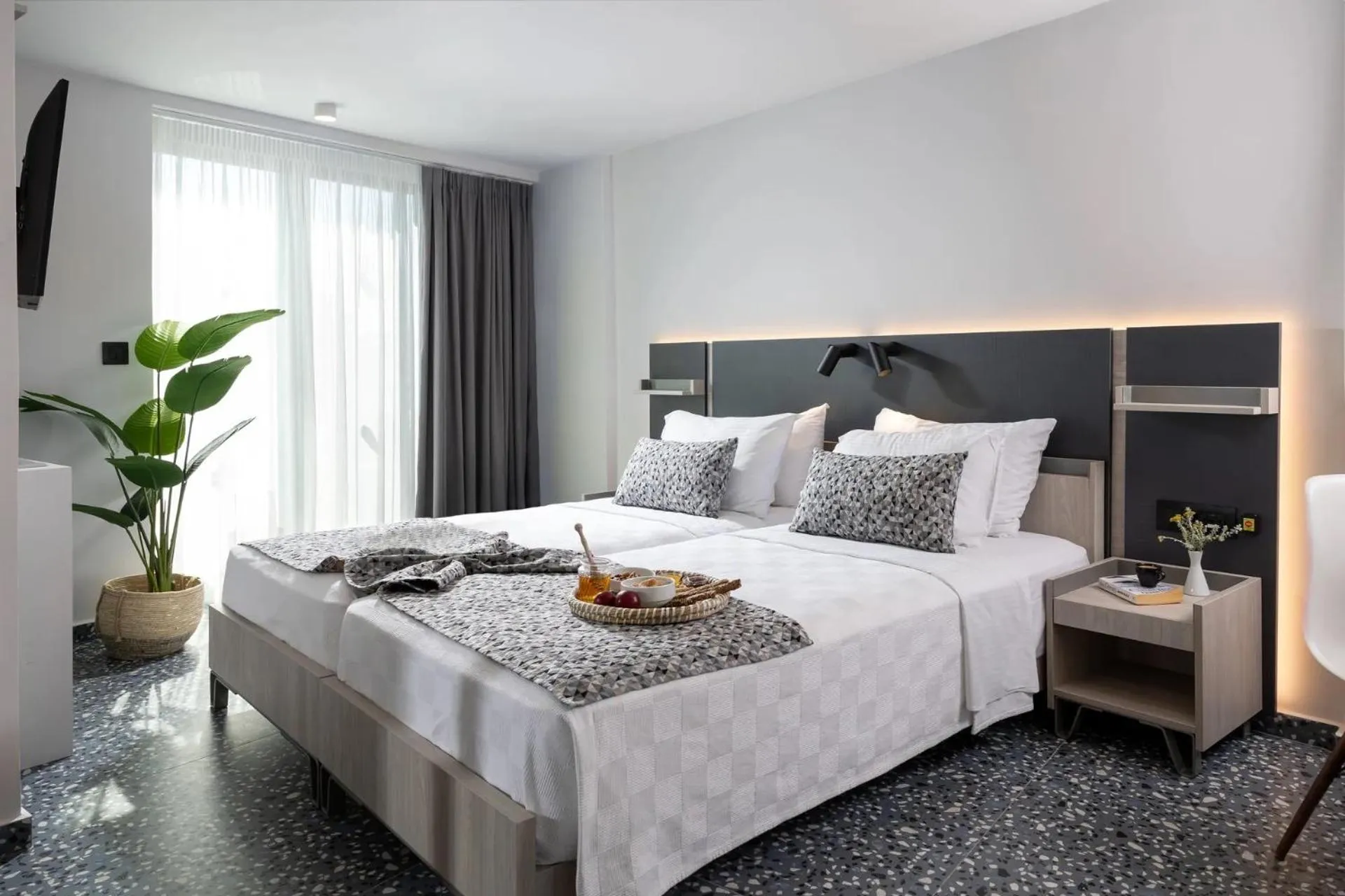 Bed in Pearl SeaBreeze Suites