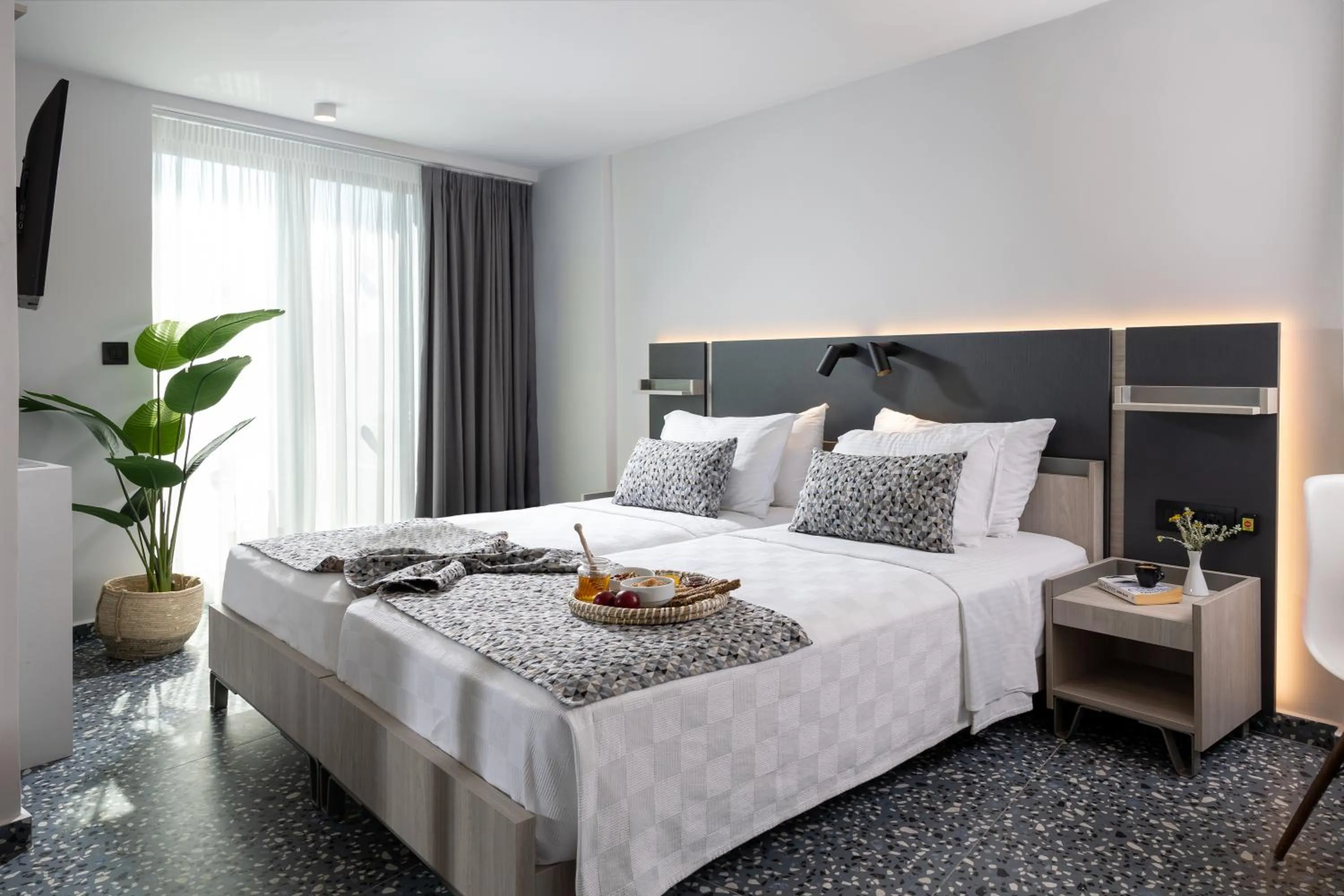 Bed in Pearl SeaBreeze Suites