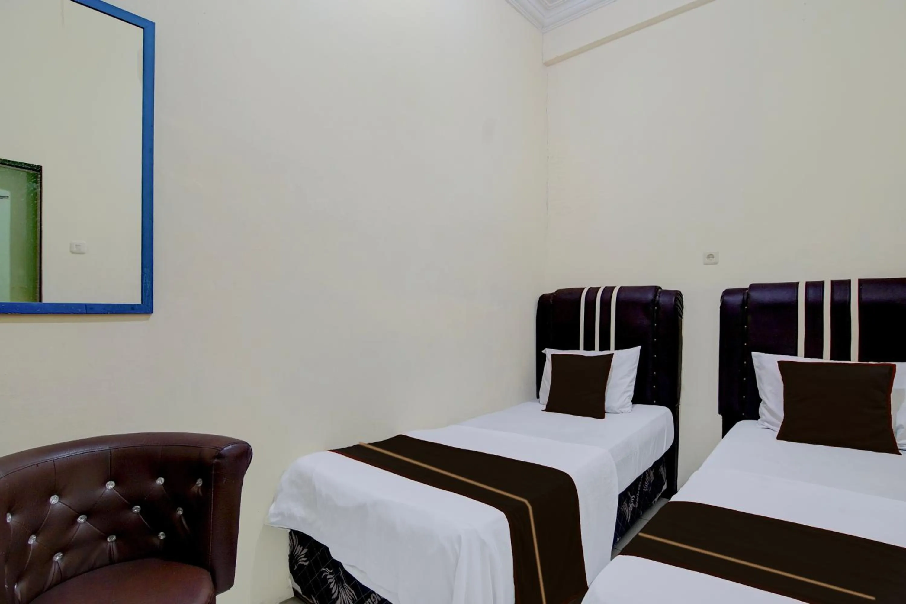 Bedroom, Bed in Hotel O Pekanbaru near Mall Ciputra Seraya formerly Lotus Inn