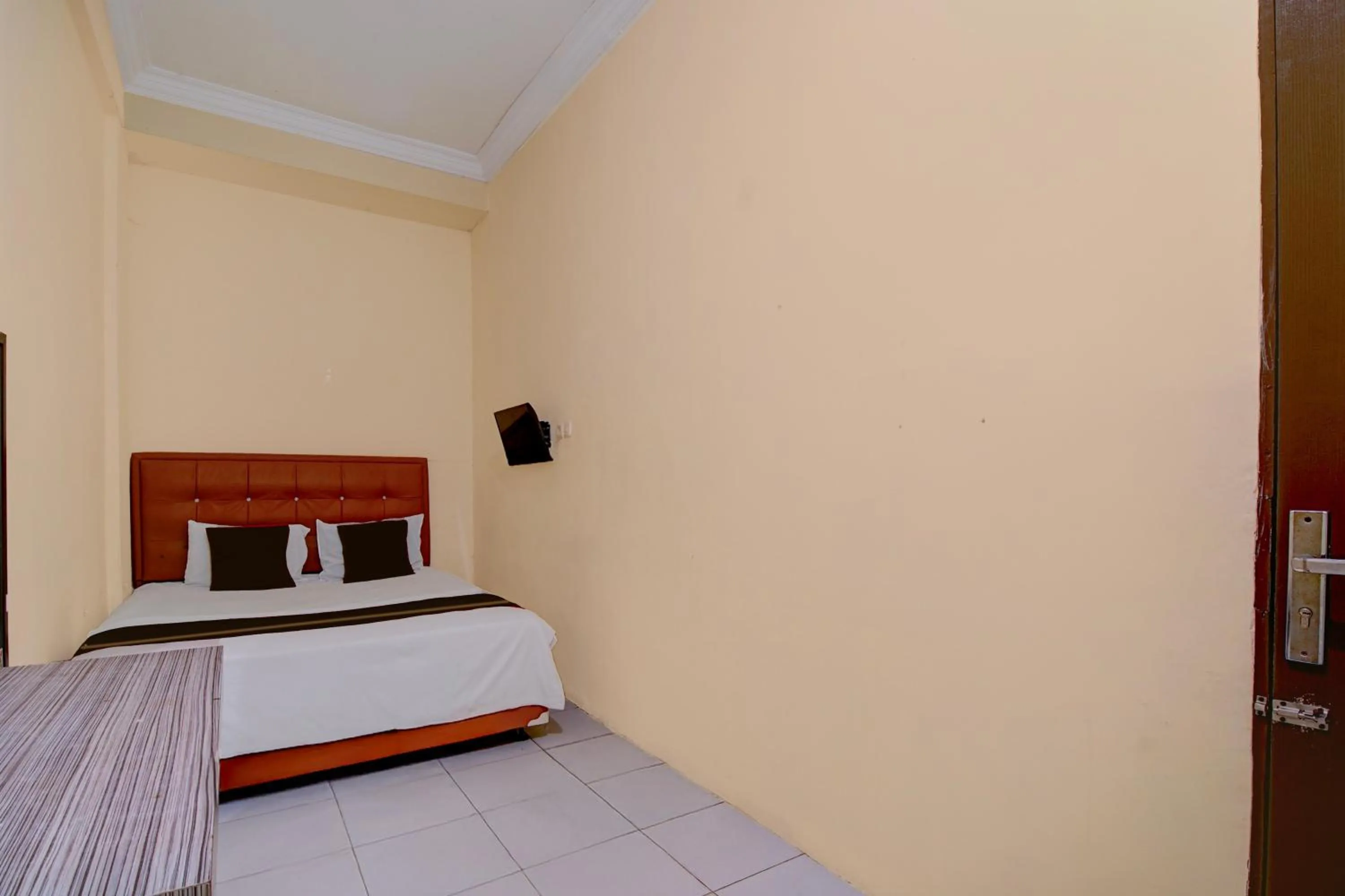 Bedroom, Bed in Hotel O Pekanbaru near Mall Ciputra Seraya formerly Lotus Inn