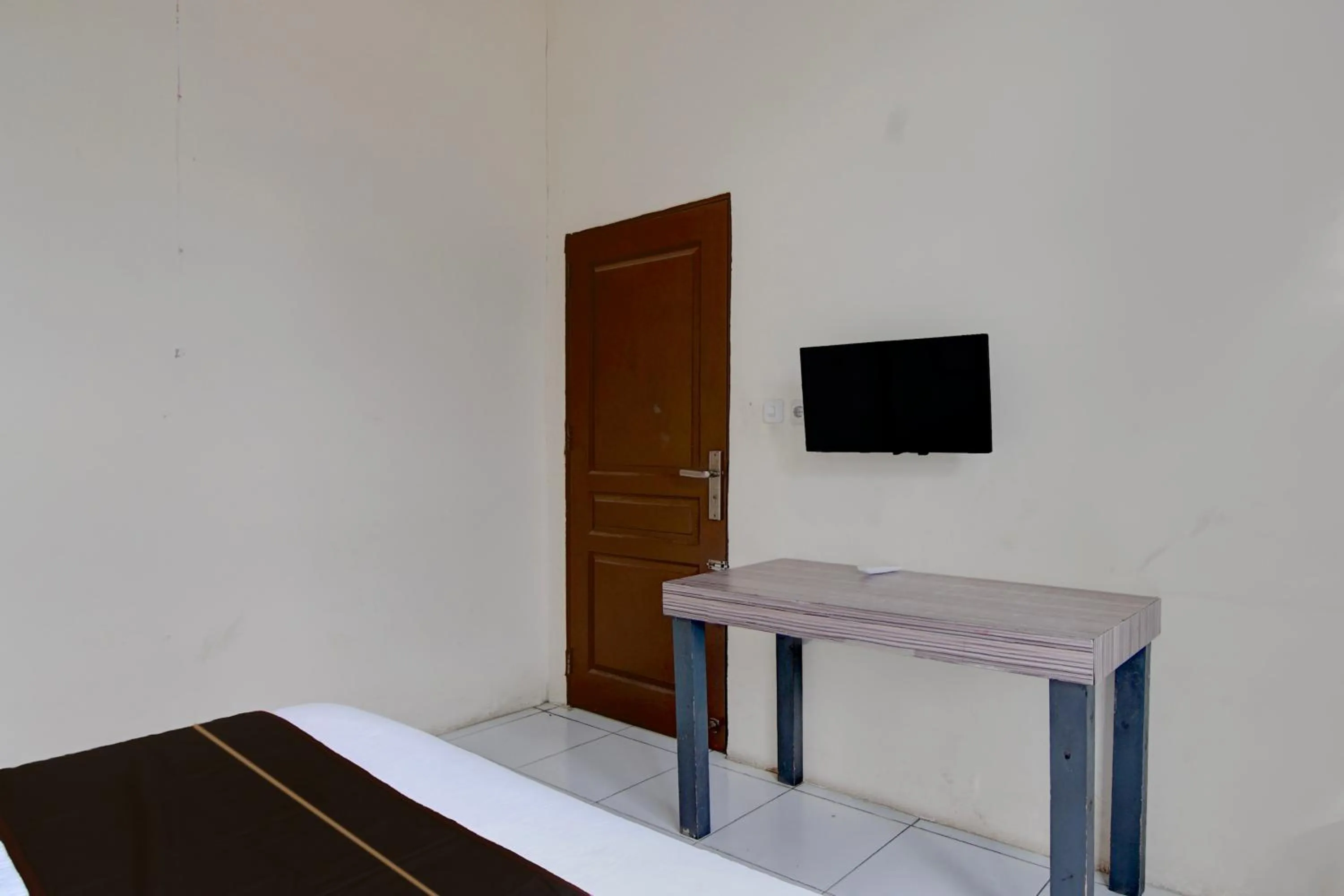 Bedroom, Bed in Hotel O Pekanbaru near Mall Ciputra Seraya formerly Lotus Inn