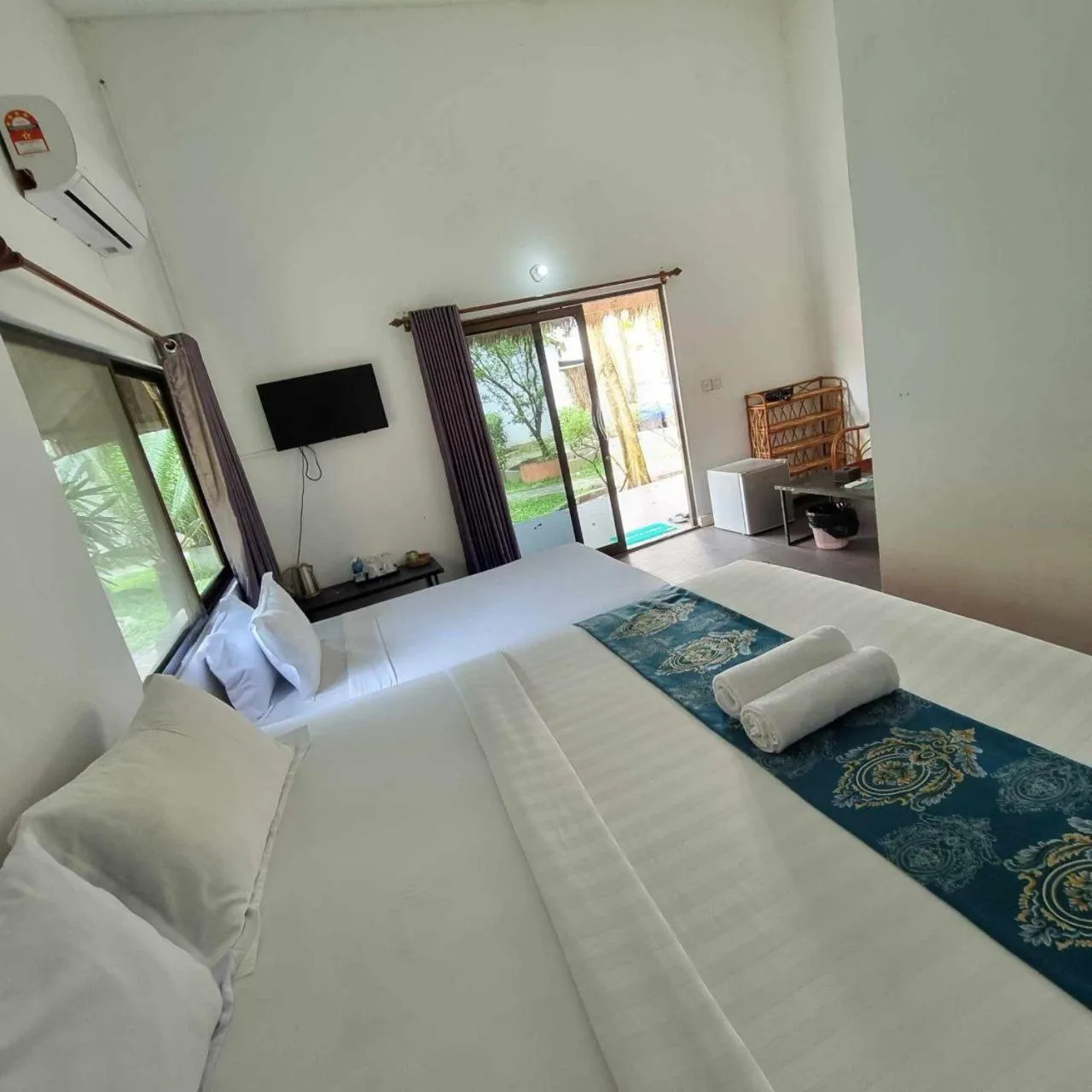 Bed in Mittali Beach Hotel